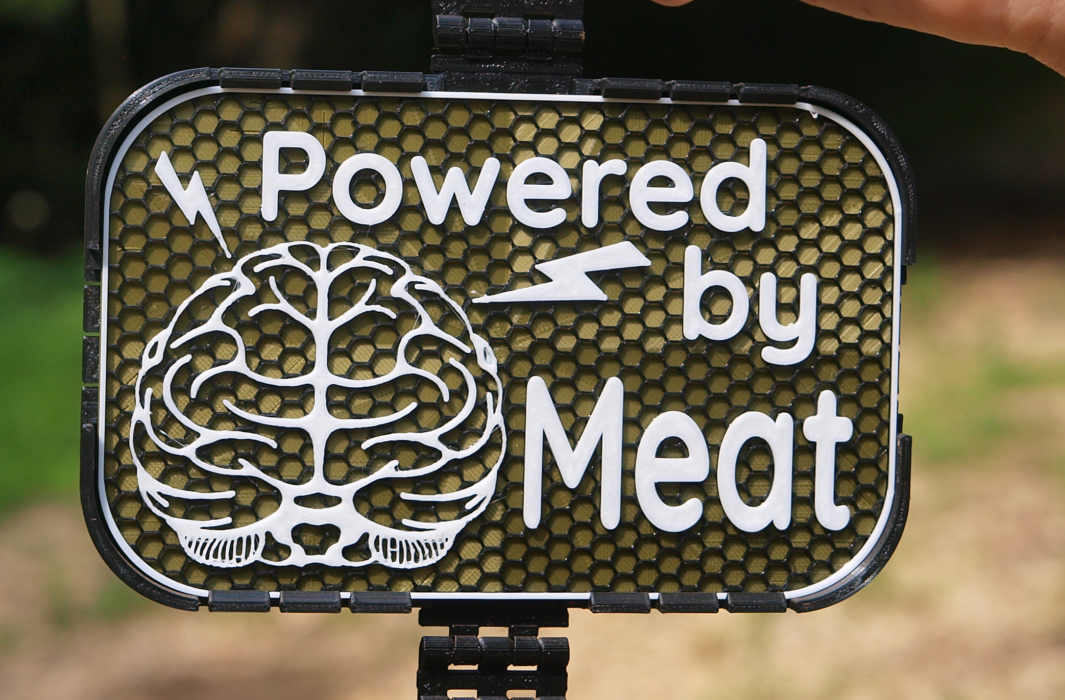 Powered by Meat sign