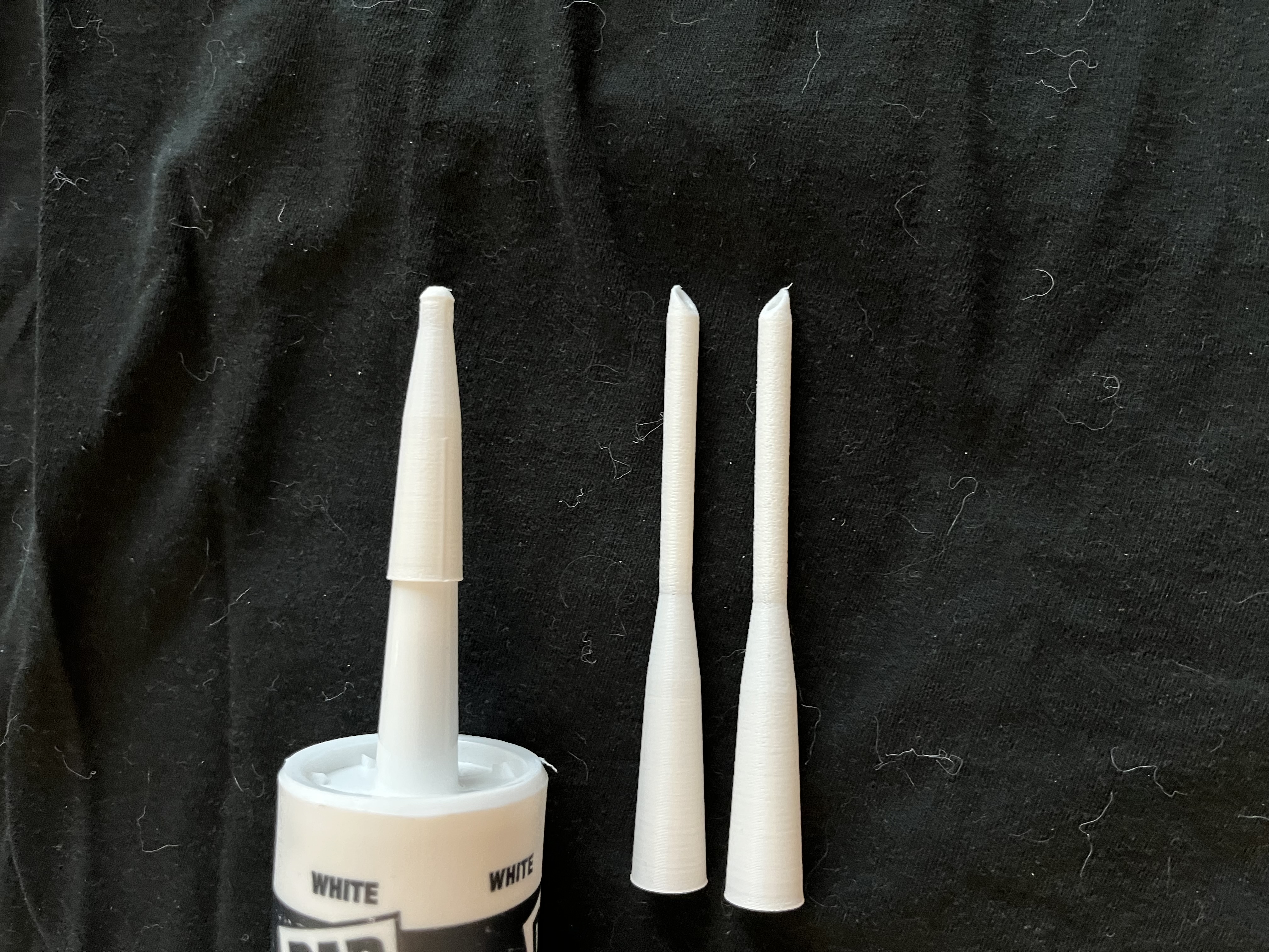 Caulk gun extension and cap 3D model