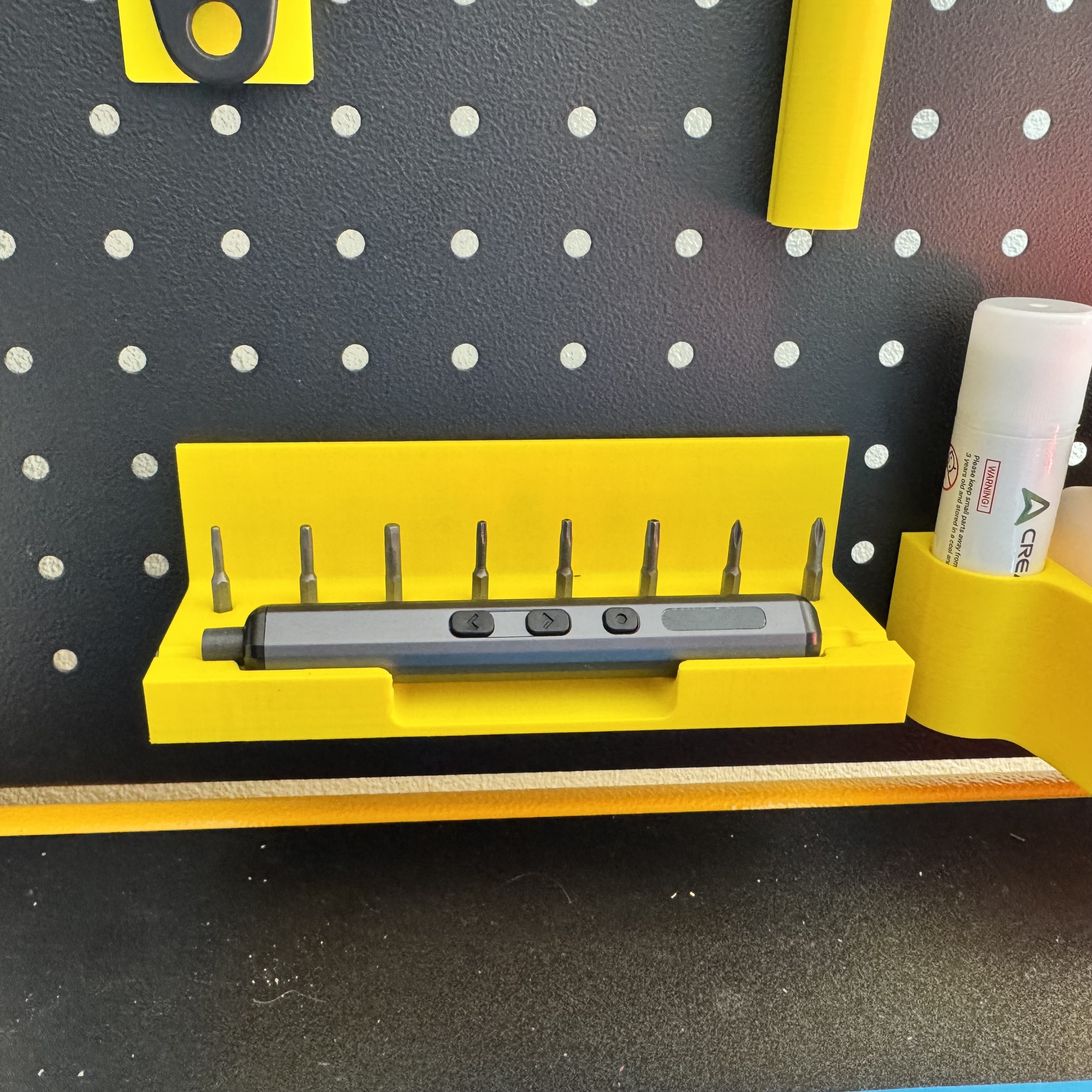 Pegboard holder for precision electric screwdriver (4mm bit)