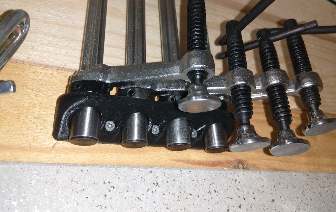 Wall mount for 16mm welding table clamps