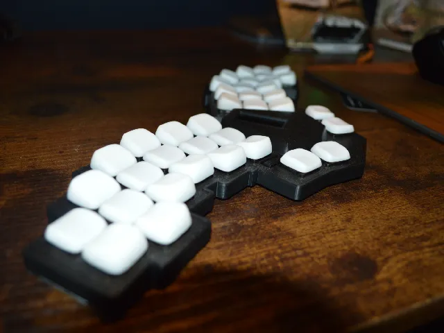 Hephaestes38, an ergonomic, 38 key low profile bluetooth keyboard.