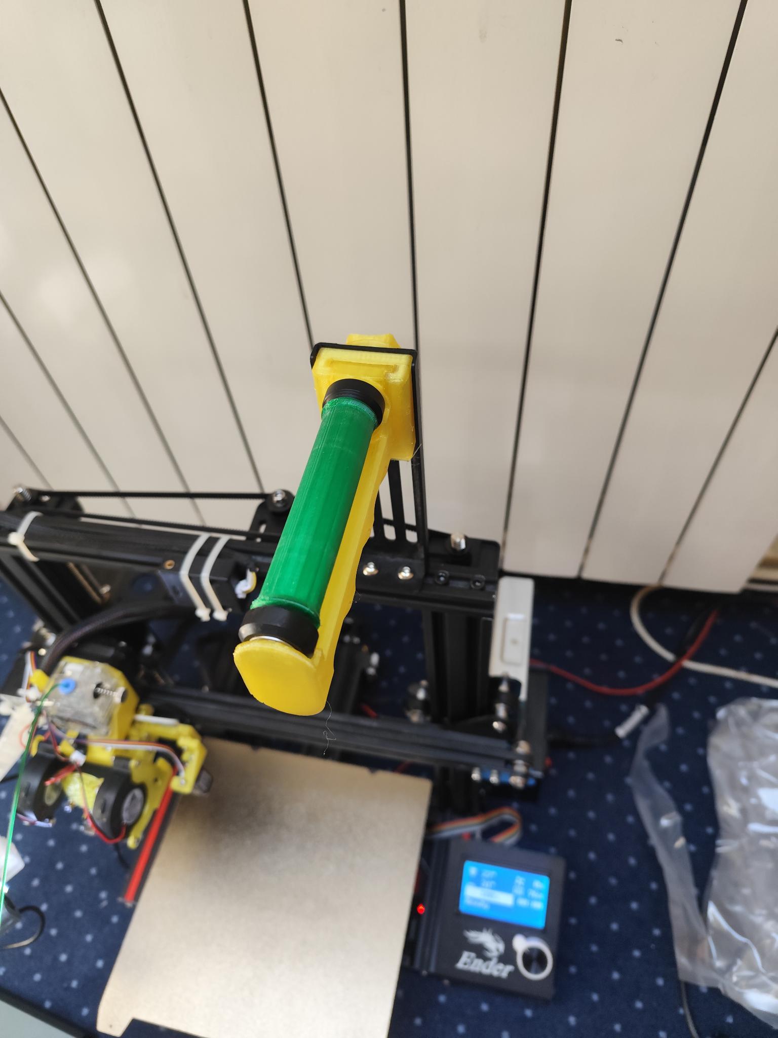 Fill hold roller with v-roller wheel bearing