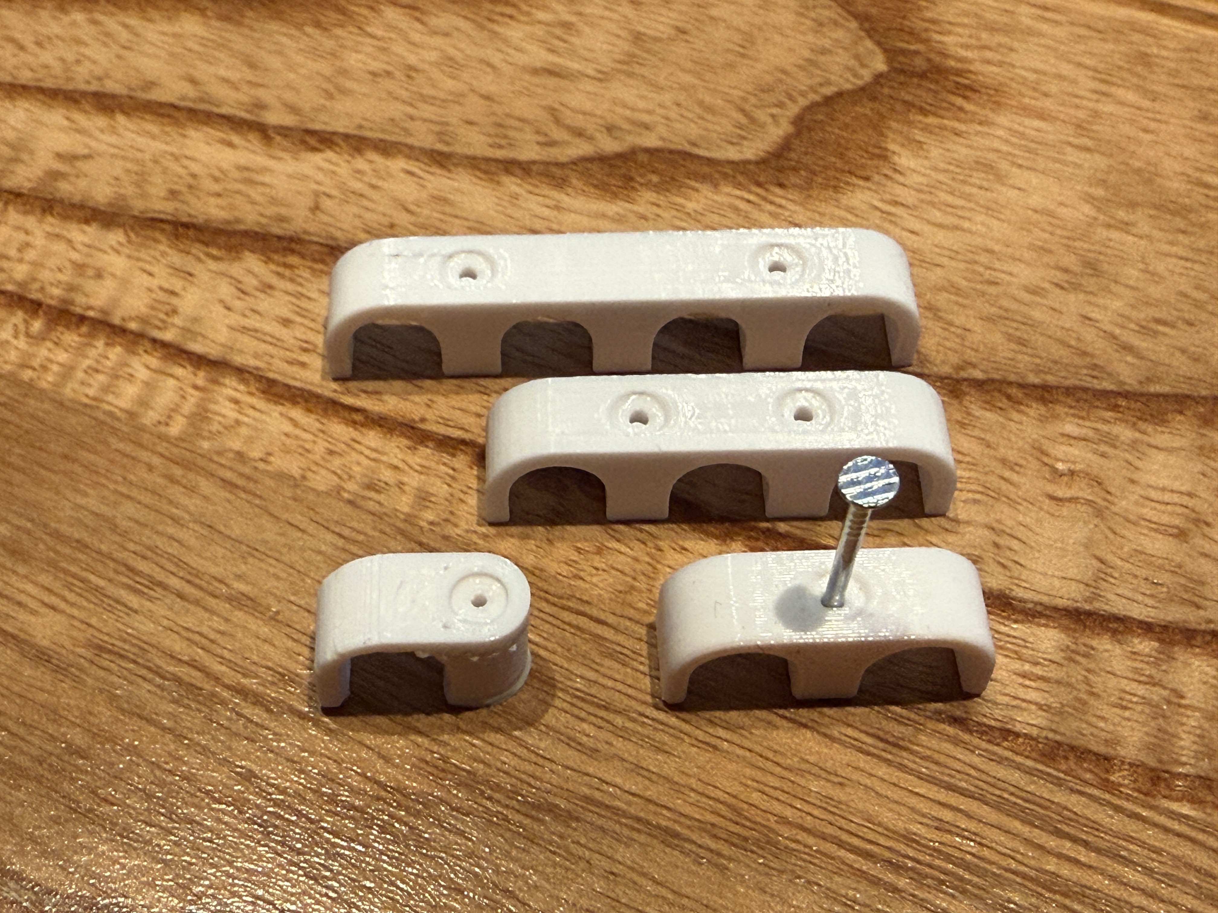 Single, double, triple and quadruple cable clamp