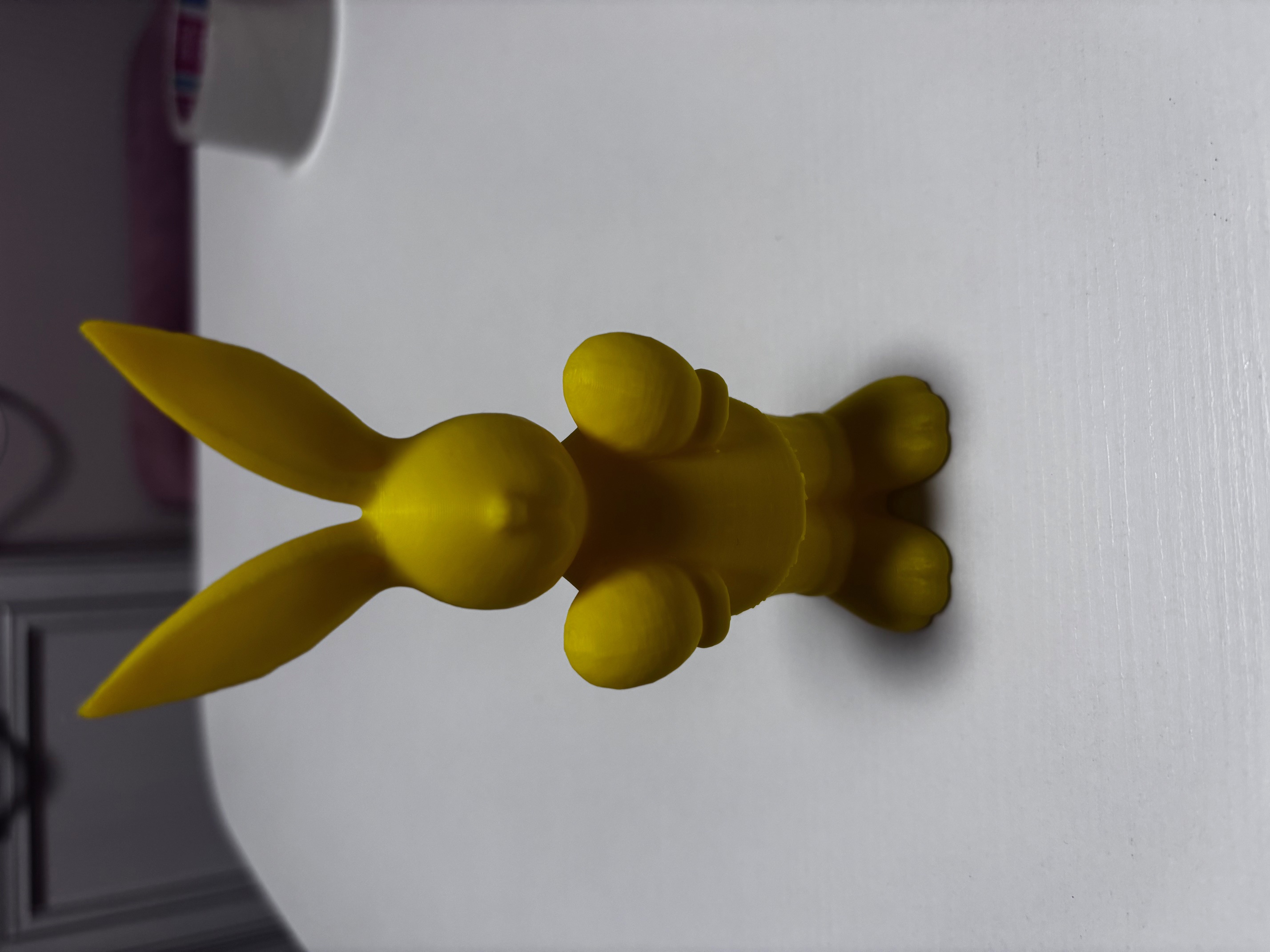 Easter bunny holding eggs
