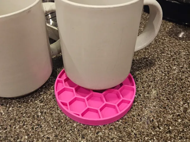 Hexagon drink coaster with spill catcher