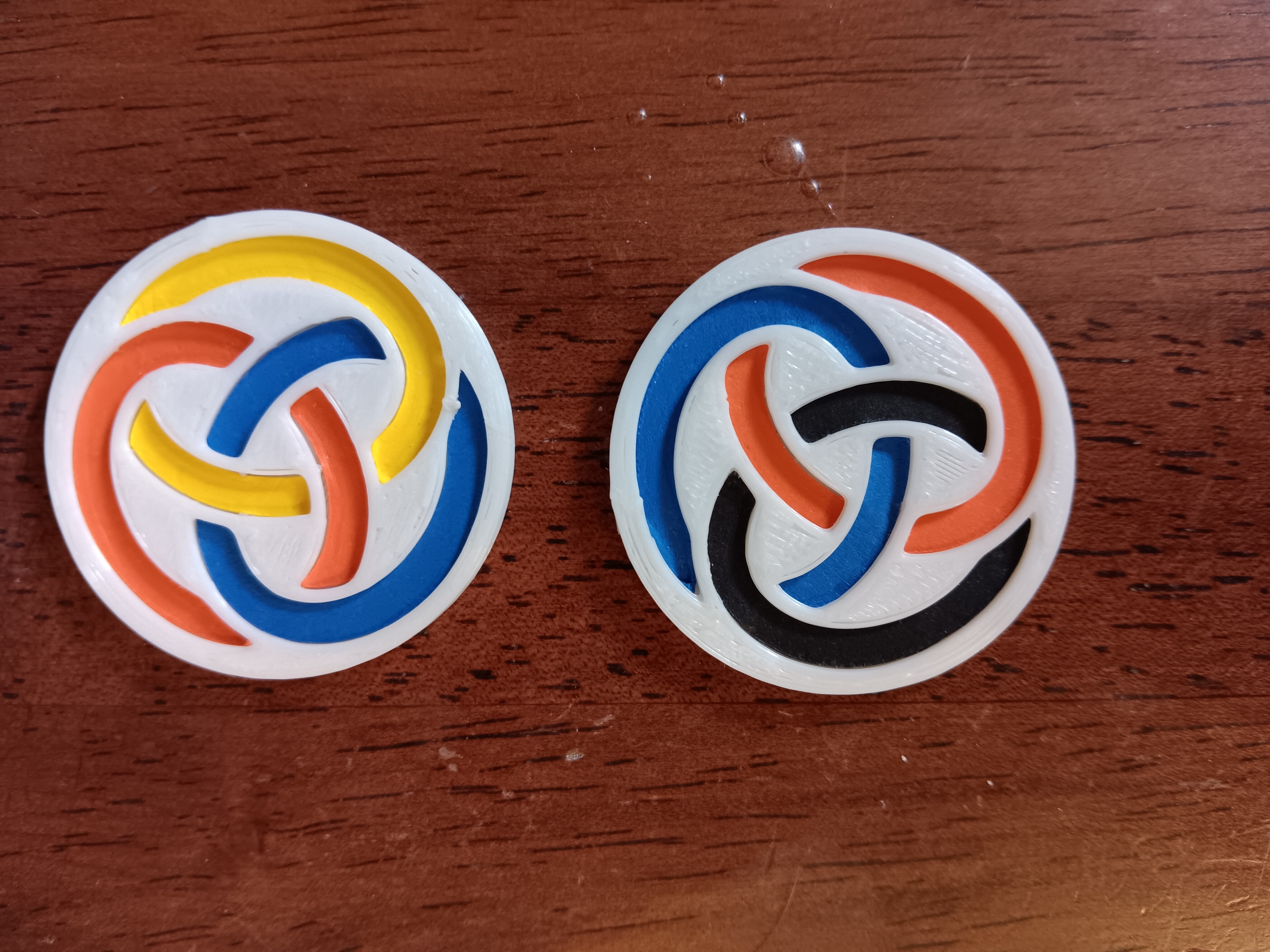 Decorative Borromean ring design with inlaid cardstock