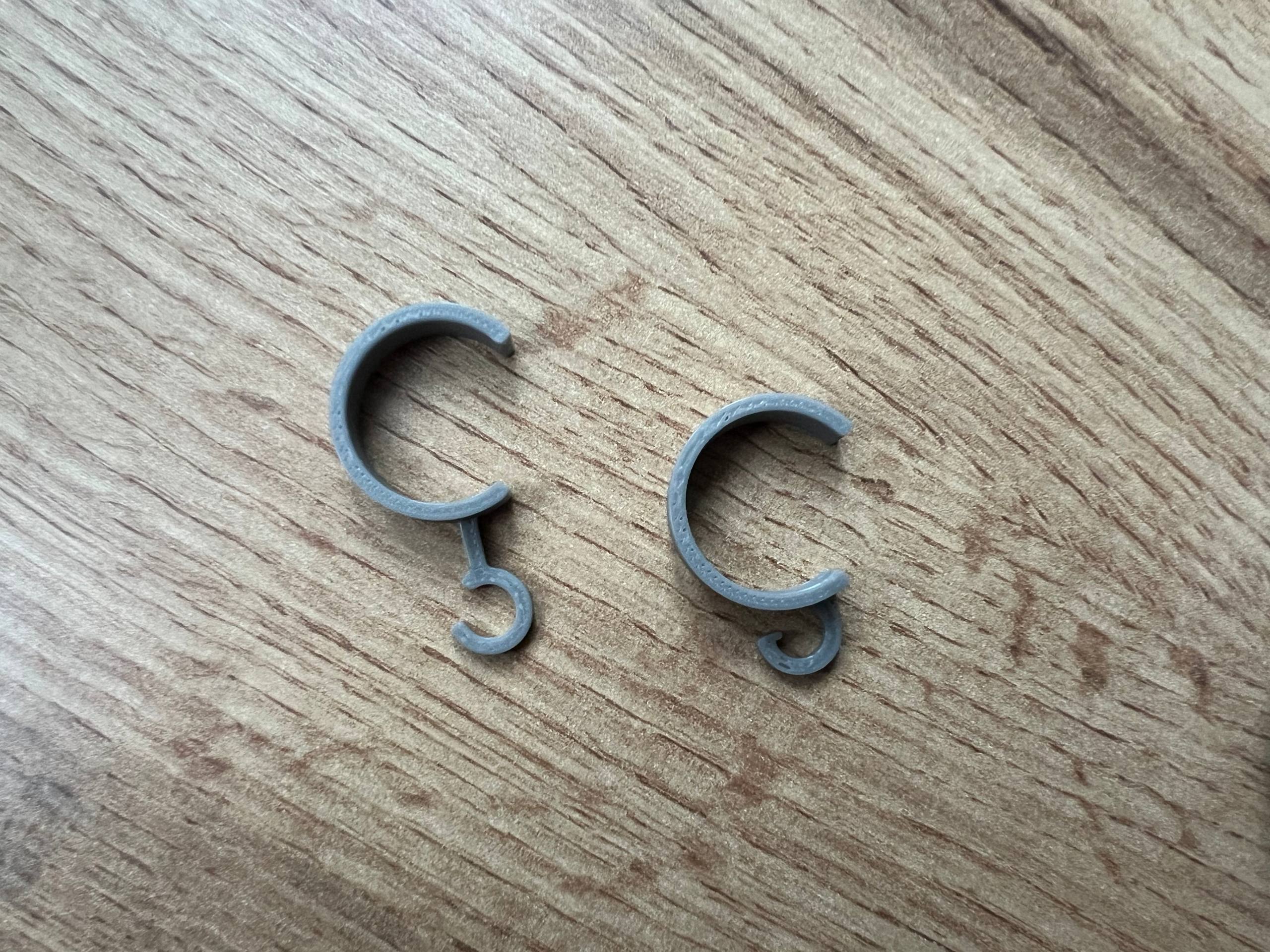 Curtain rod hook