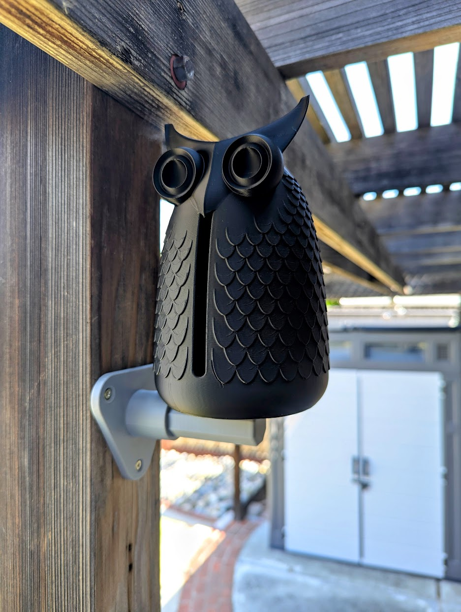 An owl perch for the hooting wind chime owl