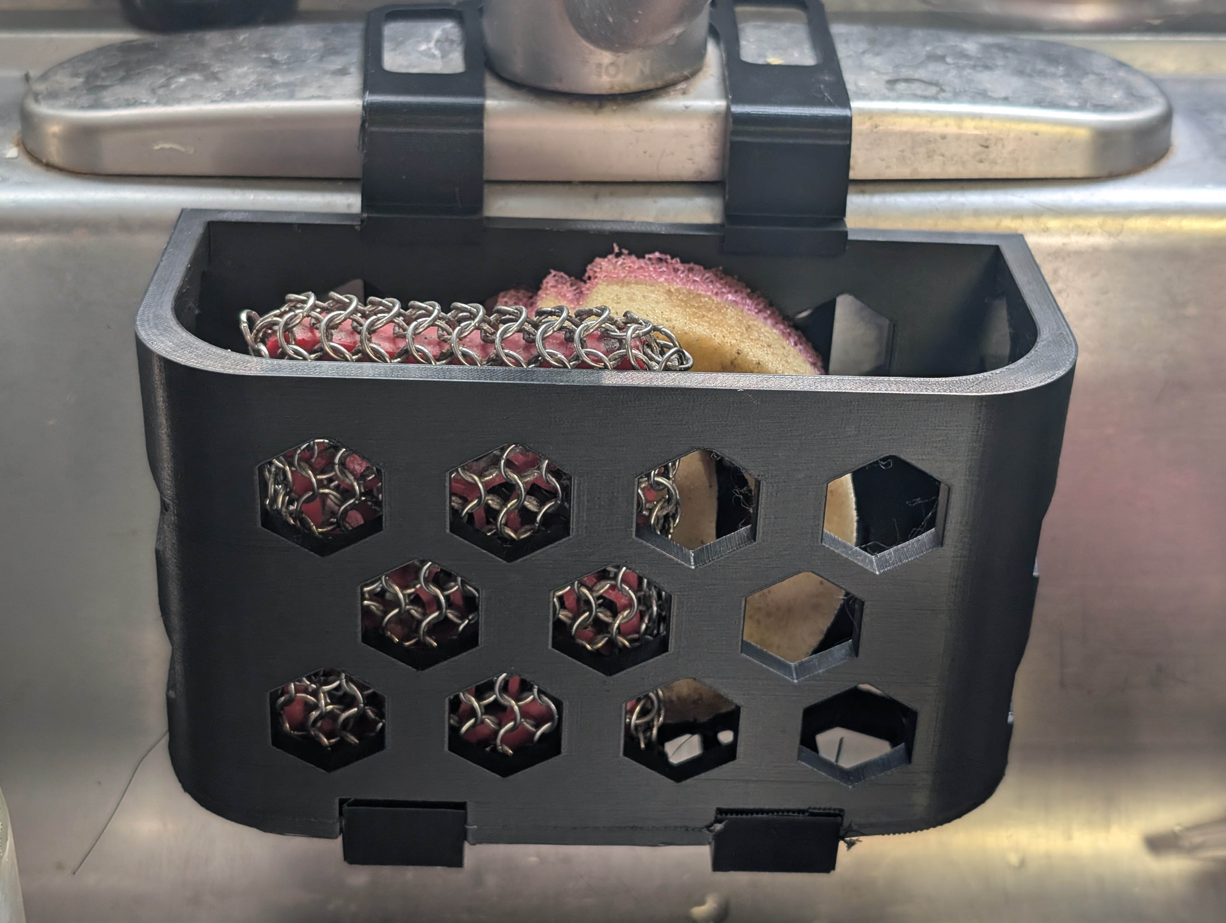 Sponge holder for kitchen sink