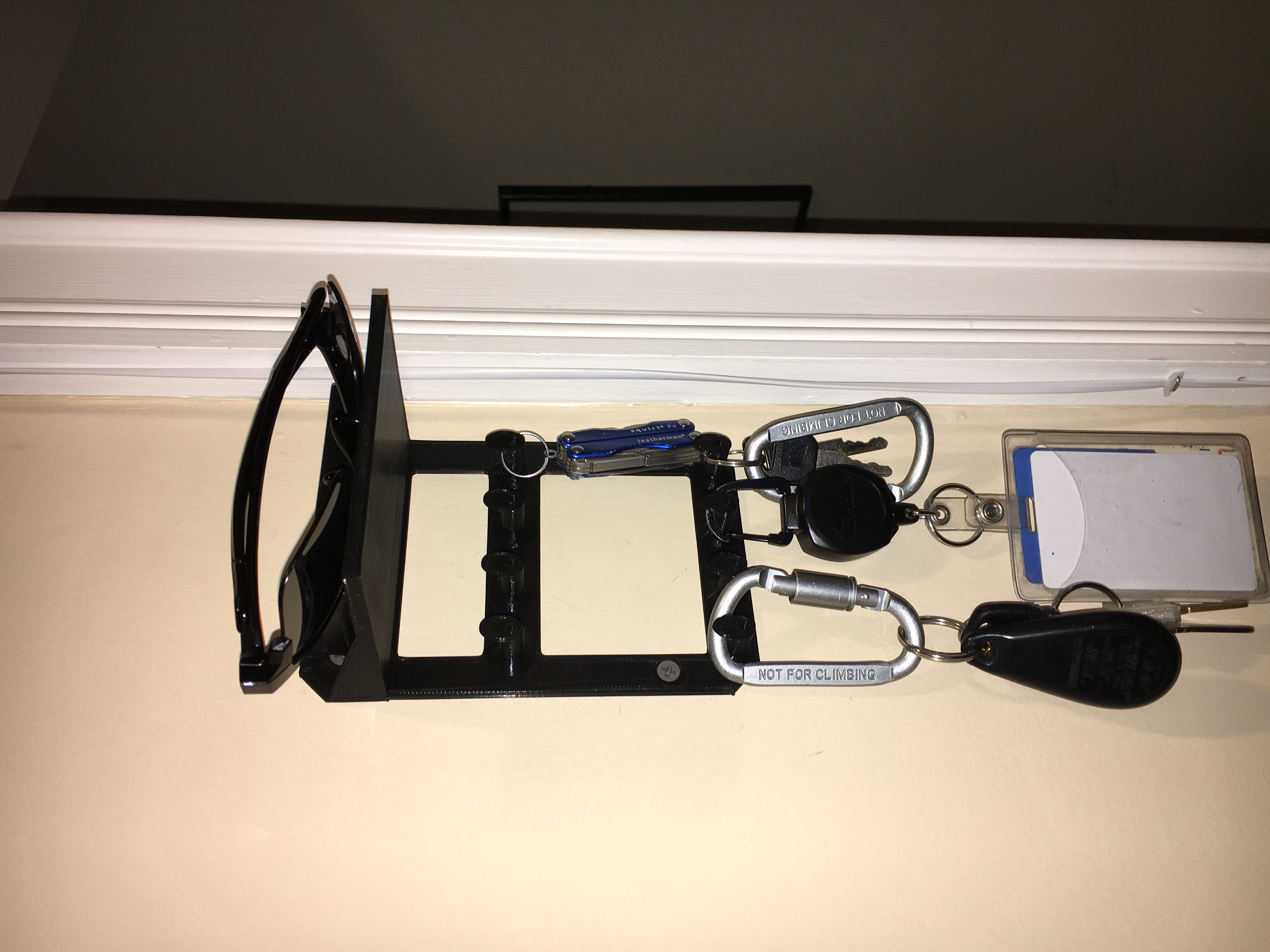 Wall Mounted Shelf with Key Hooks.