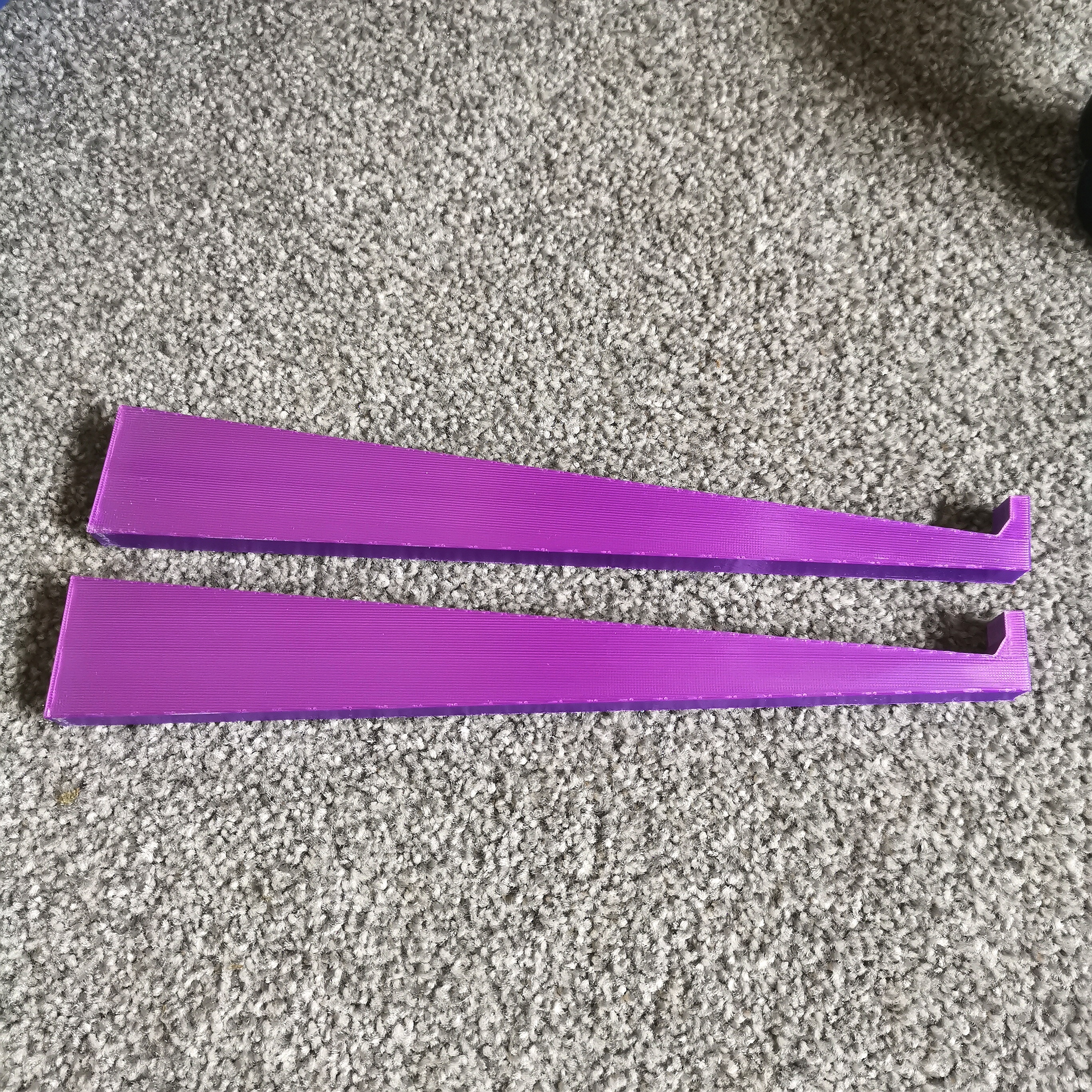 Simple computer stand with no adjustments.