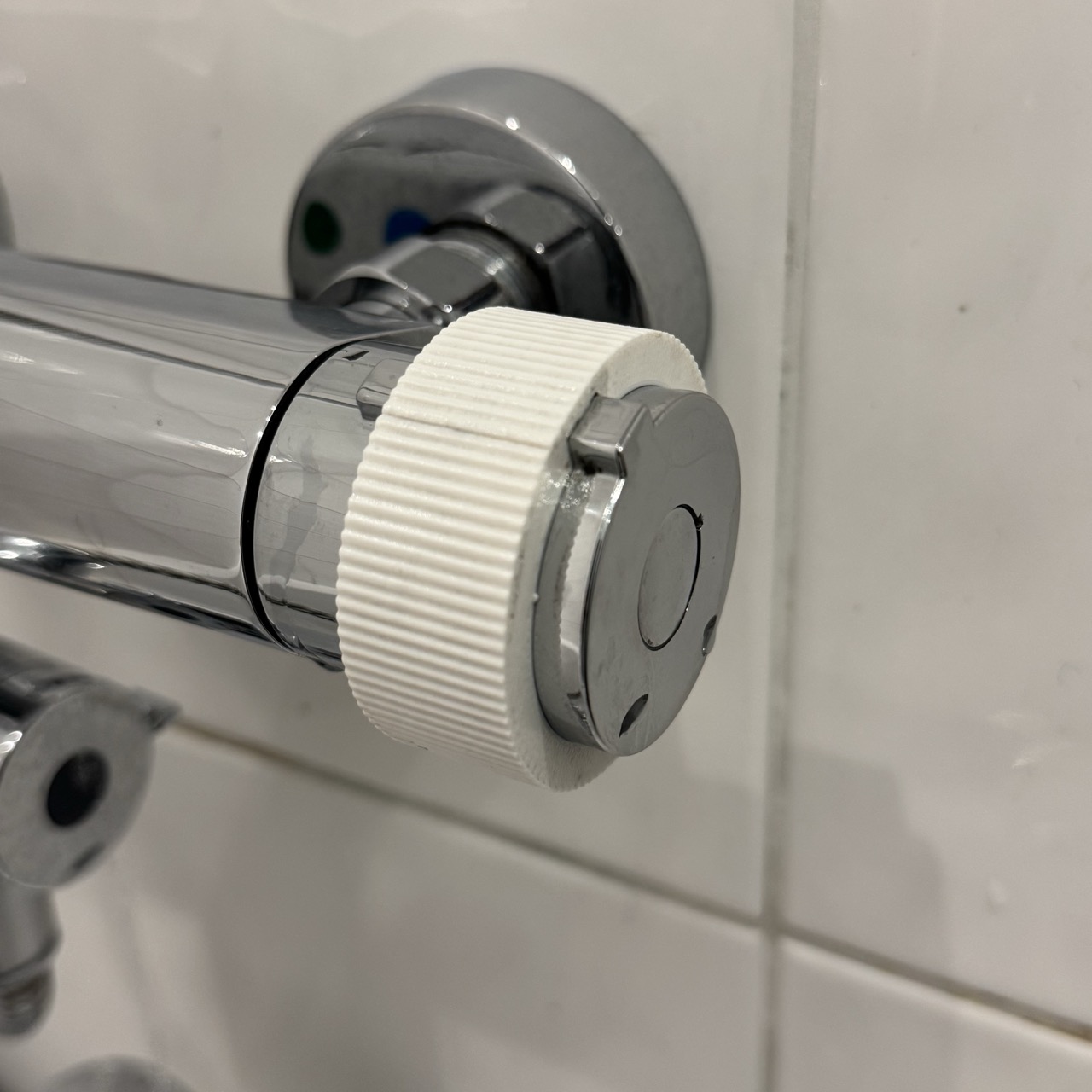 Shower handle grip