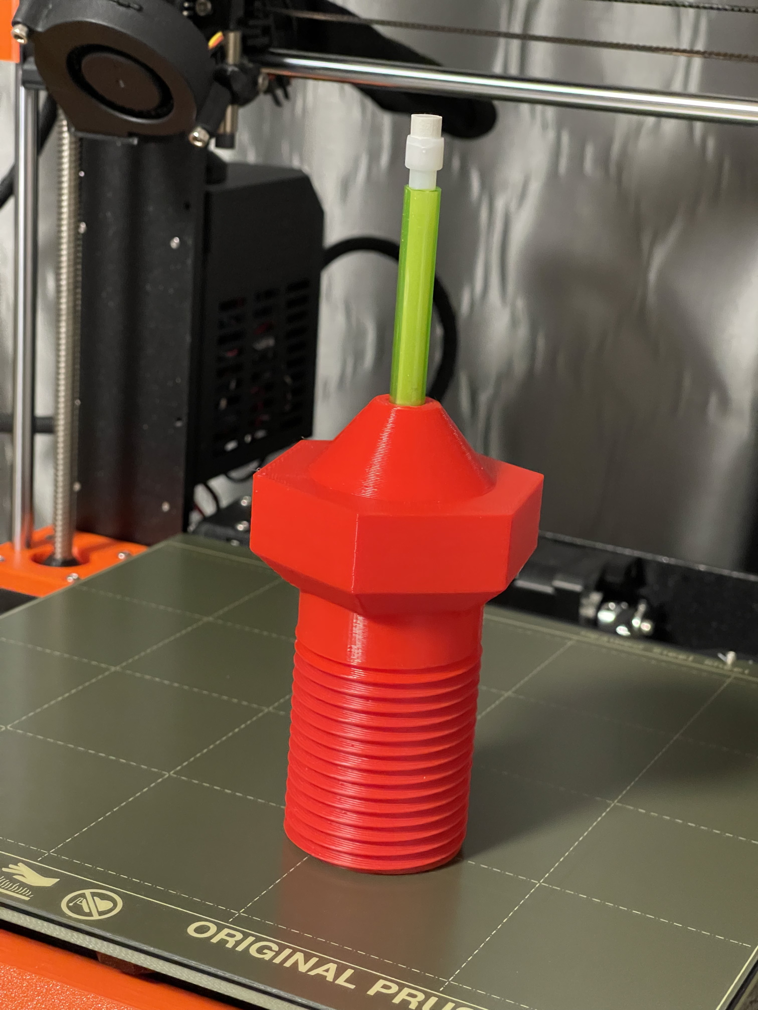 Totally impractical nozzle pen holder