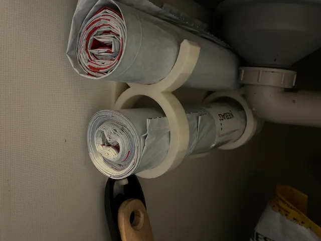 Trash bag roll holder with hand brush and shovel holder