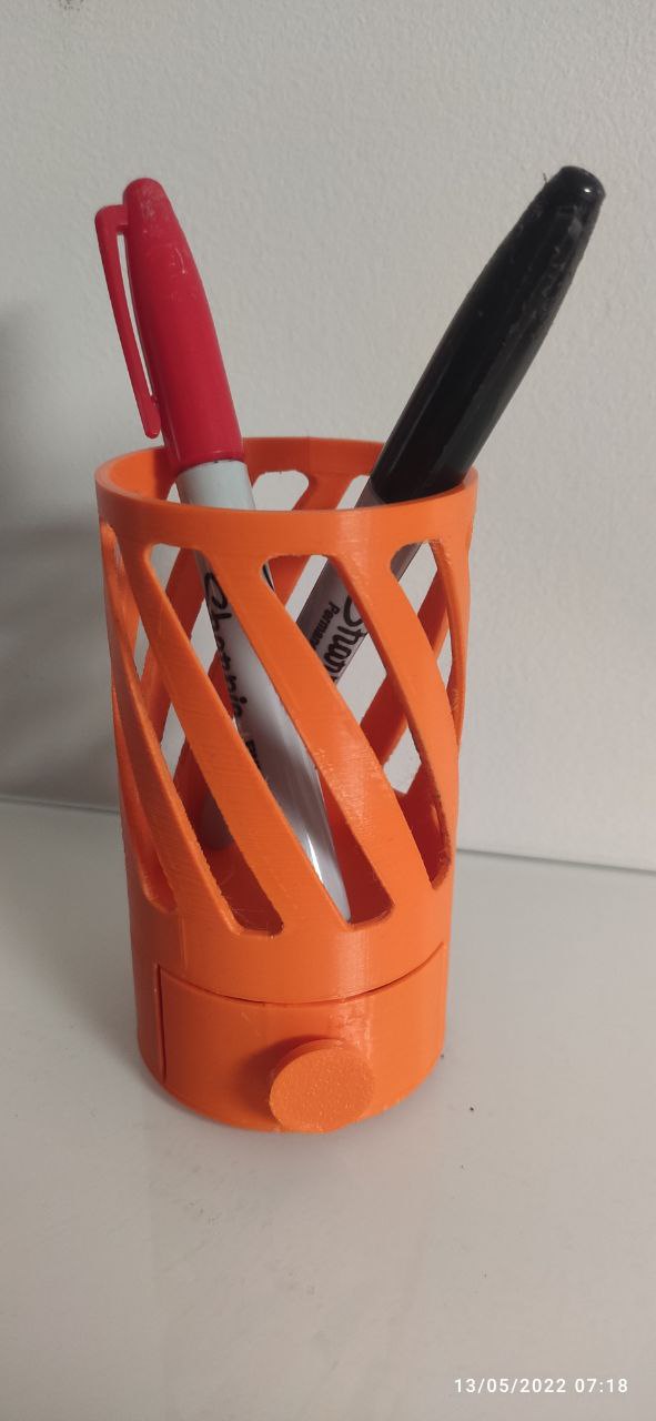 Pencil cup and sharpener