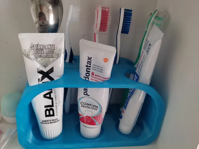 Slightly oversized toothbrush holder