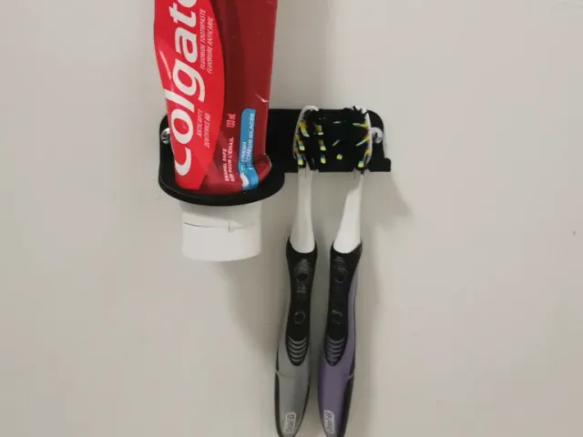 Toothbrush and toothpaste holder for two