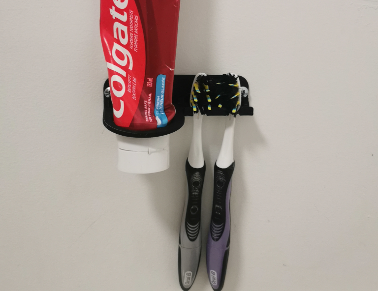 Toothbrush and toothpaste holder for two