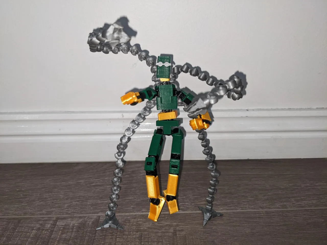 I made a custom white suit Doctor Octopus out of a Jigsaw body and