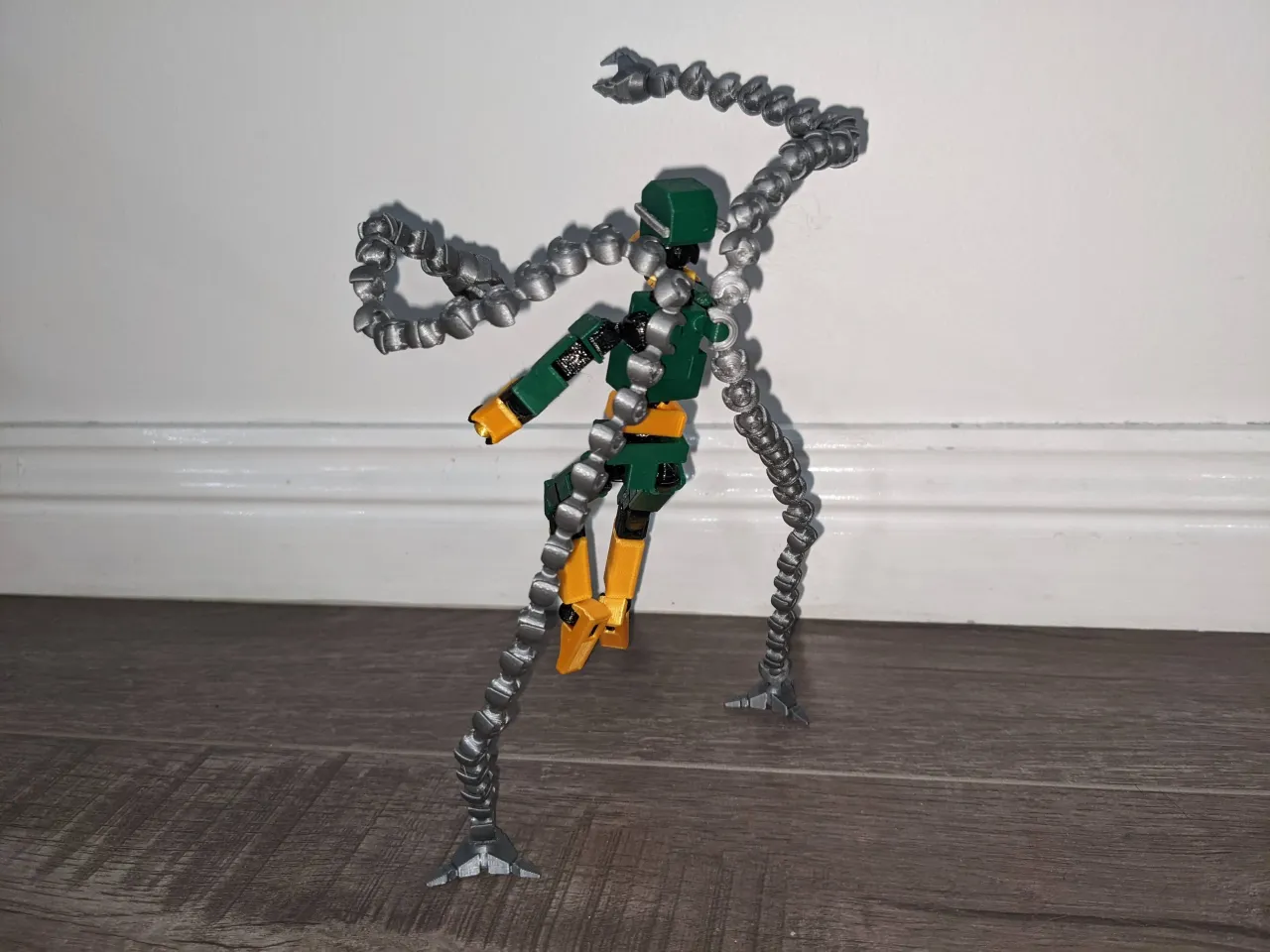 I made a custom white suit Doctor Octopus out of a Jigsaw body and