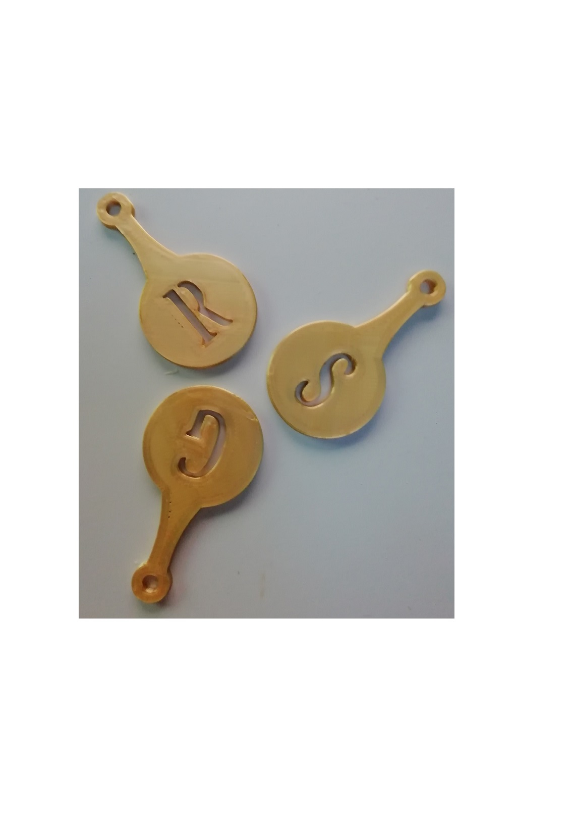 25c usd, 1€ and 2€ shopping cart coin. with name first letter