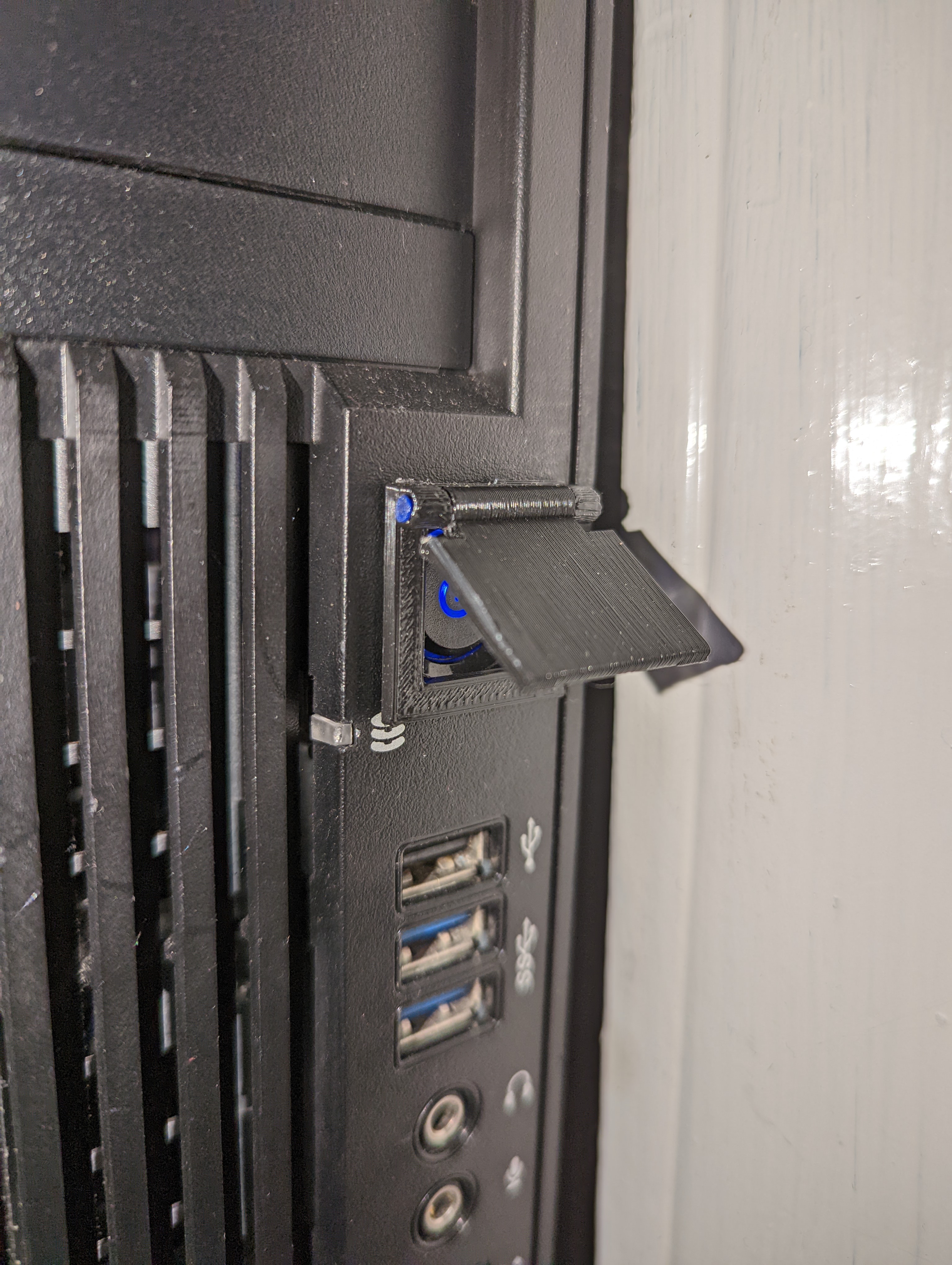 Hinged button cover