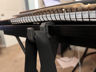 Backpack hook for desk