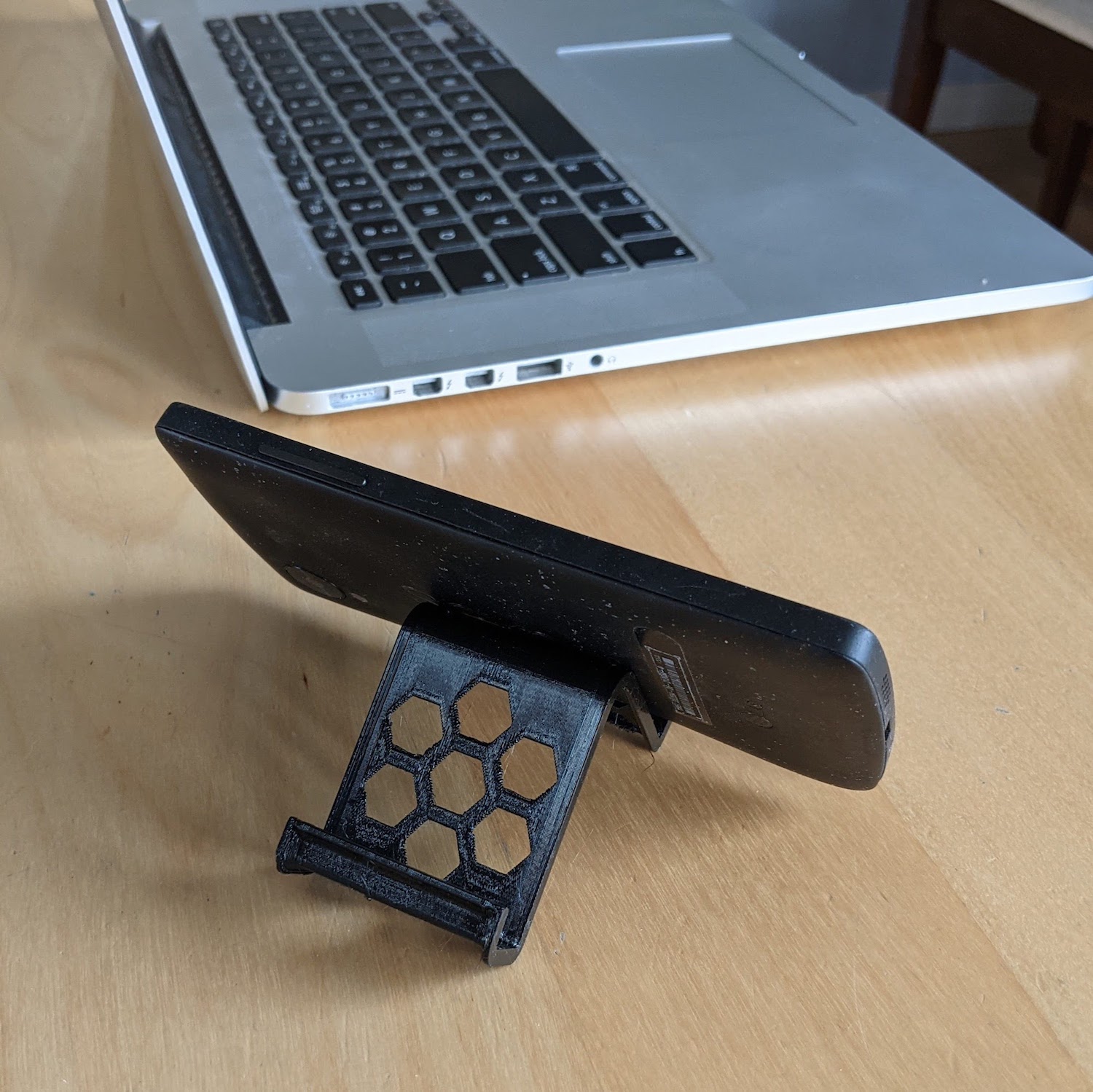 Hex Hole End of the Roll Phone Stand