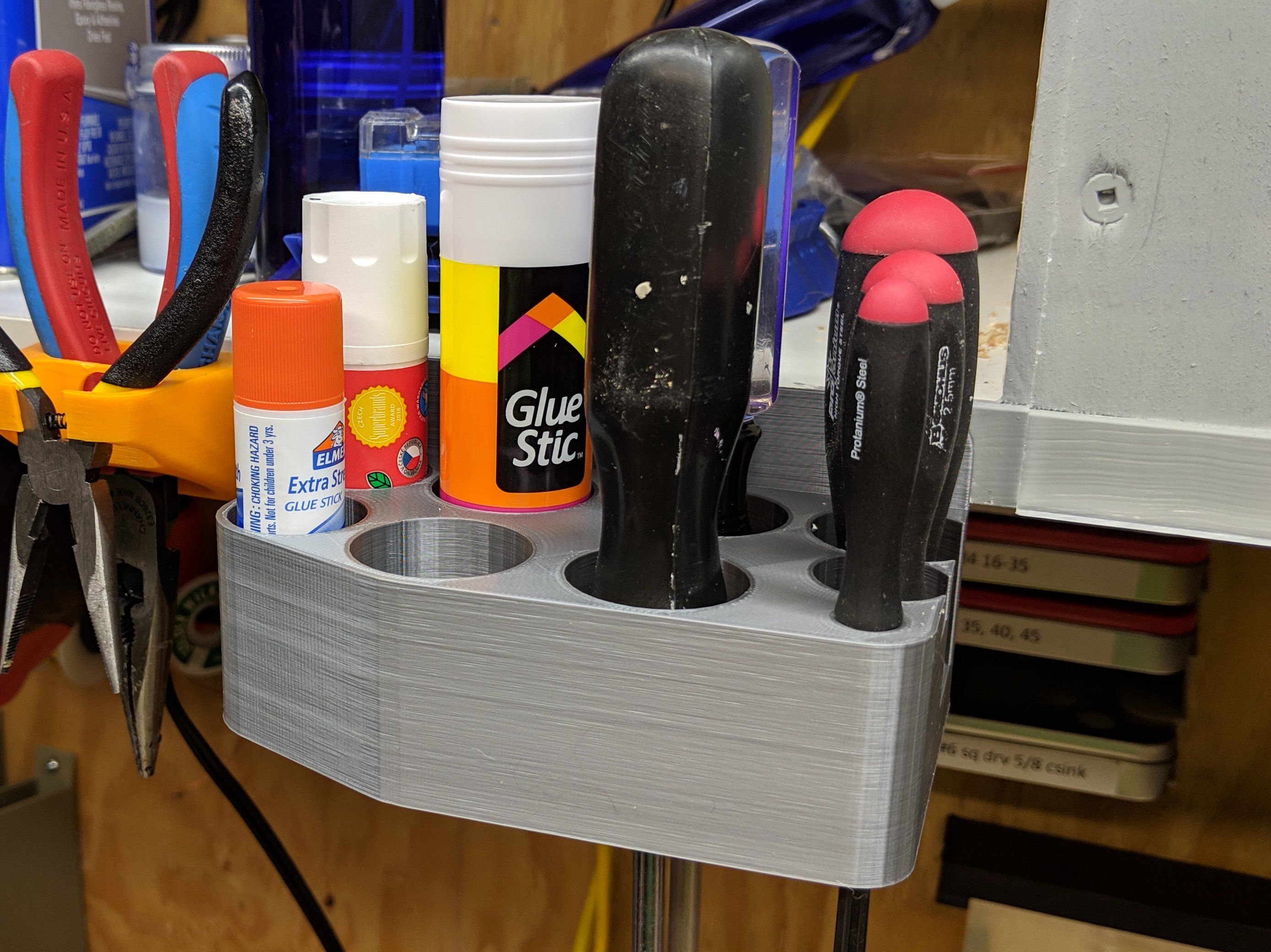 glue stick x4, screwdriver x2, hex driver x3 holder
