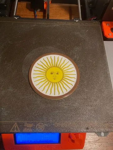 Drink coaster. Argentina Sol de Mayo emblem.