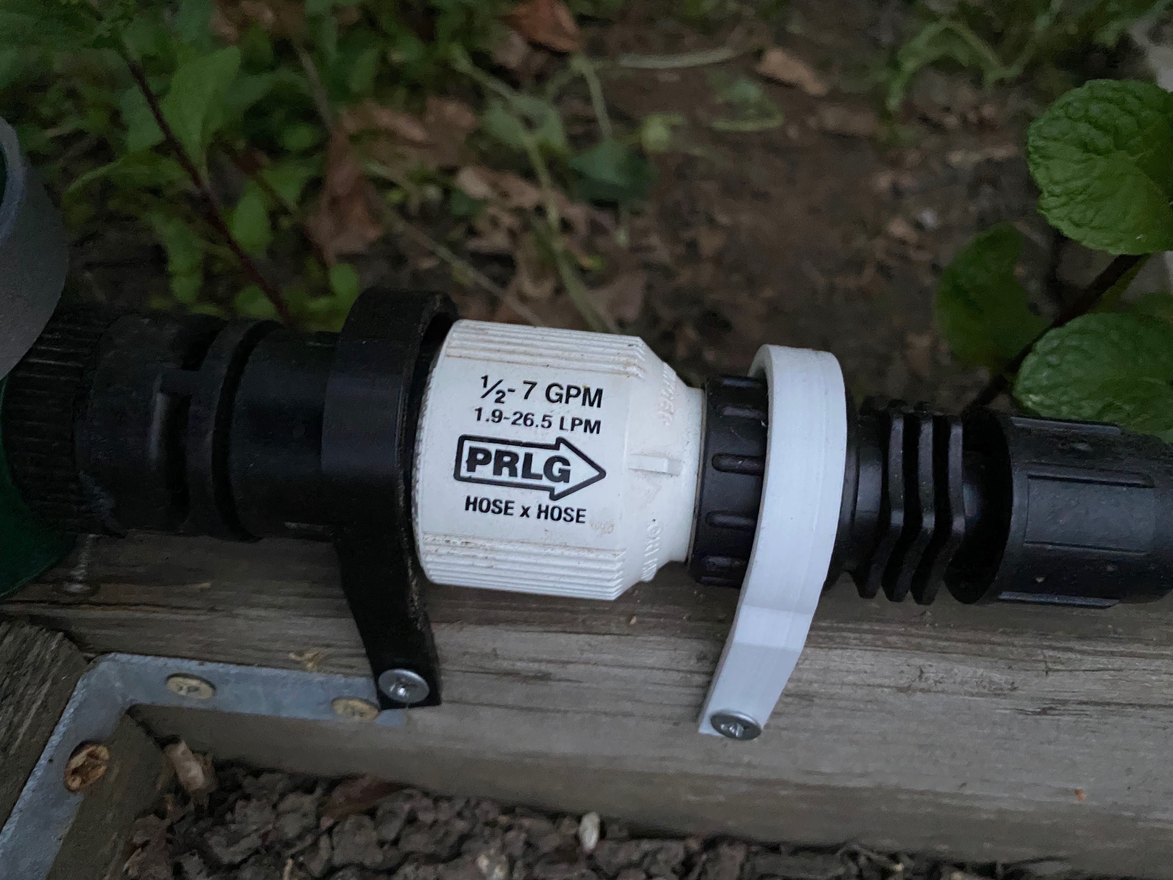 Simple J clamps for drip irrigation connectors, etc. by osbock