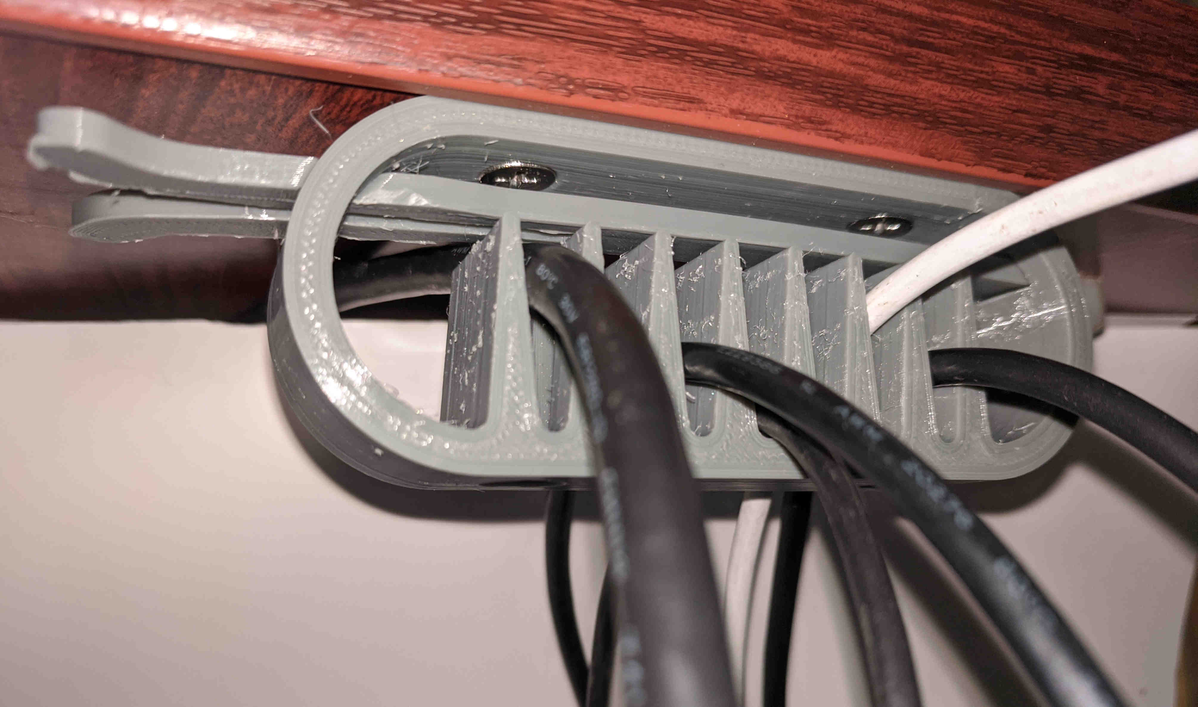 Under Desk Cable Management with Cable Lock by steriku