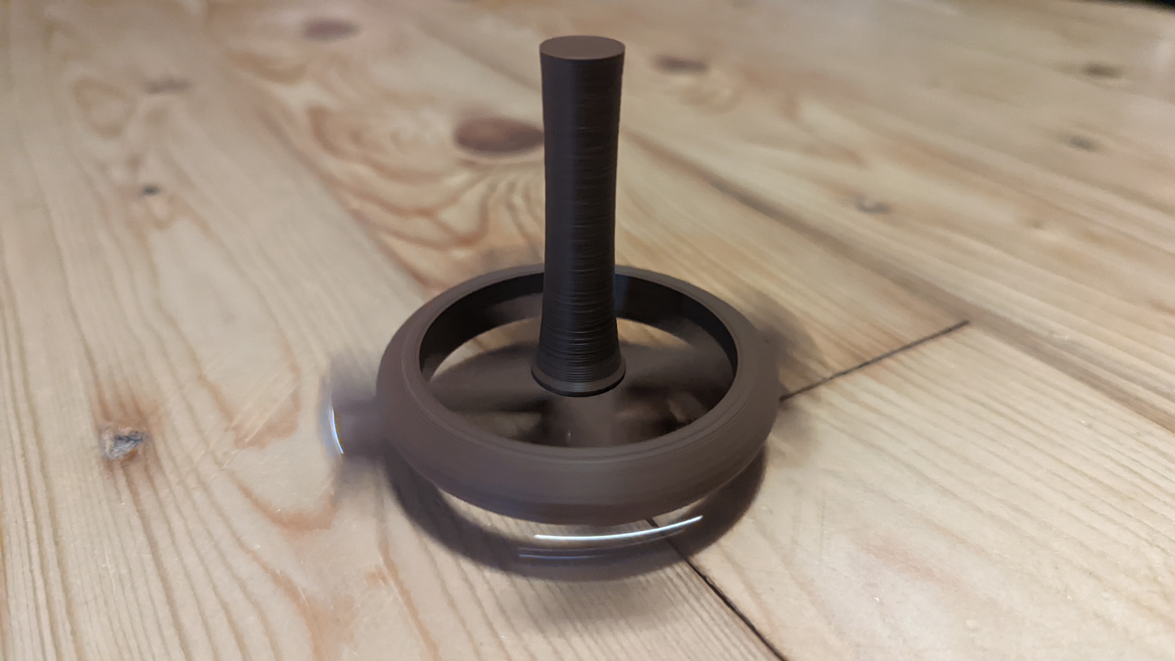 Orbital Spinning Top
