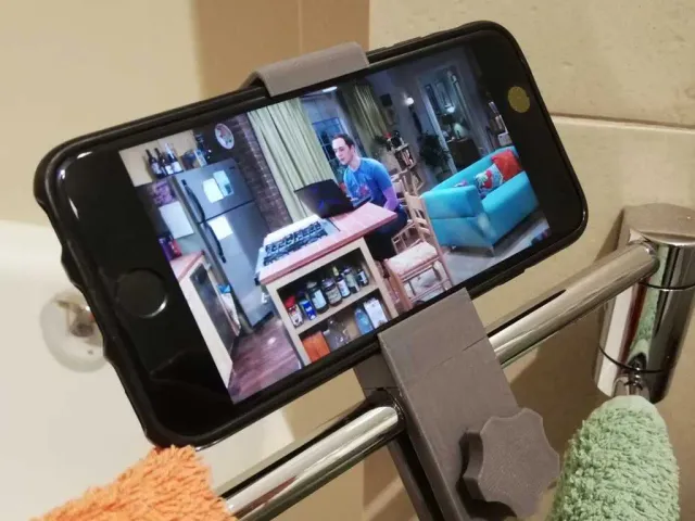 Towel rack phone holder
