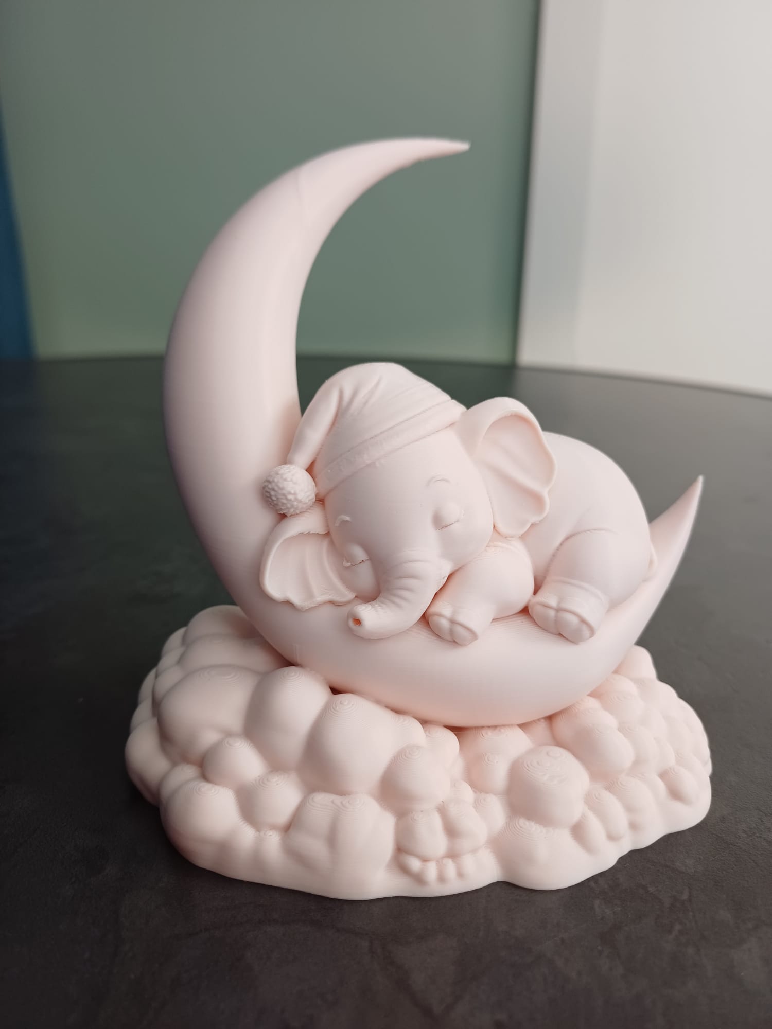 Sleeping Baby Elephant on Crescent Moon