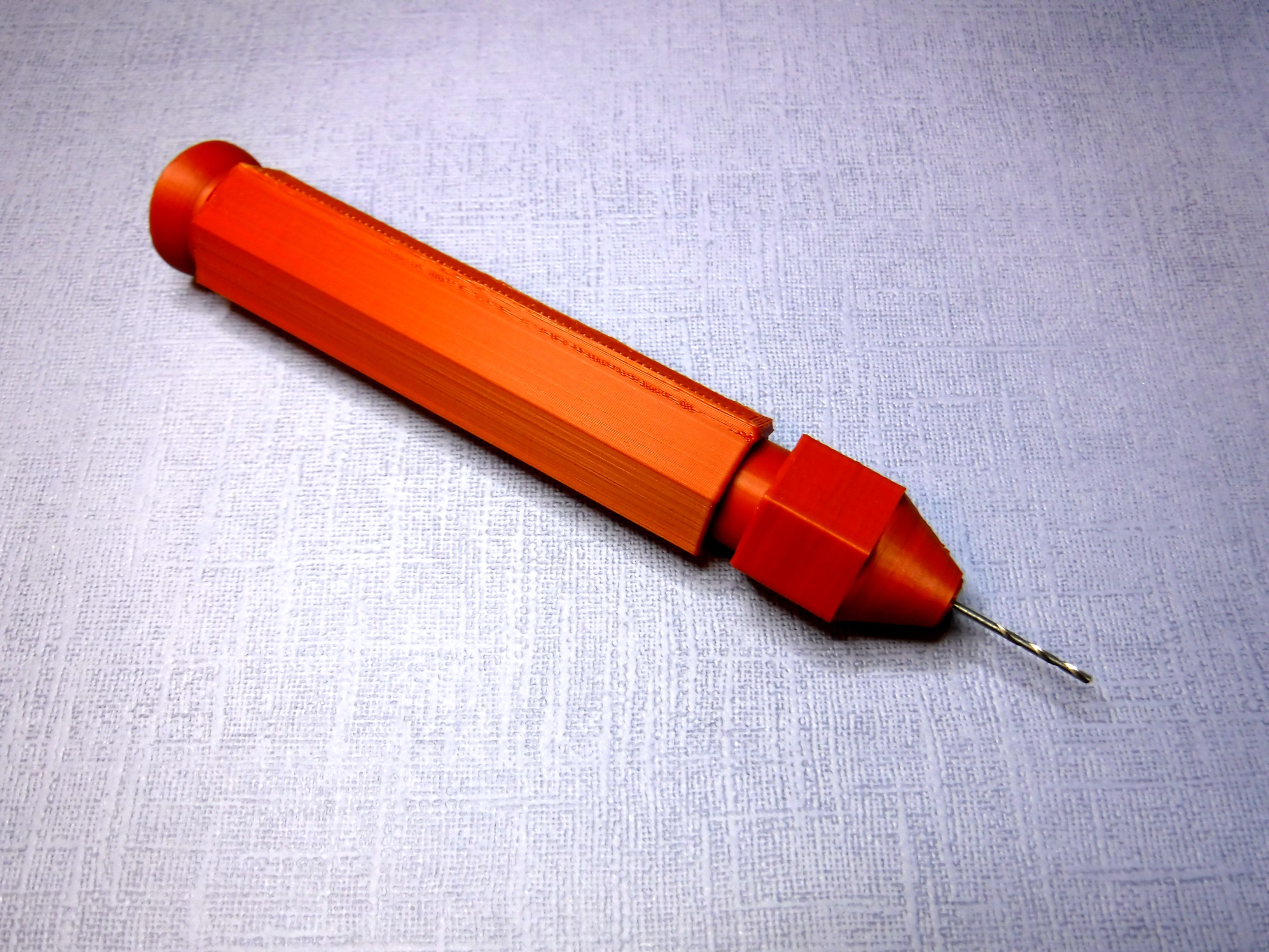 Pin vice/drill with storage