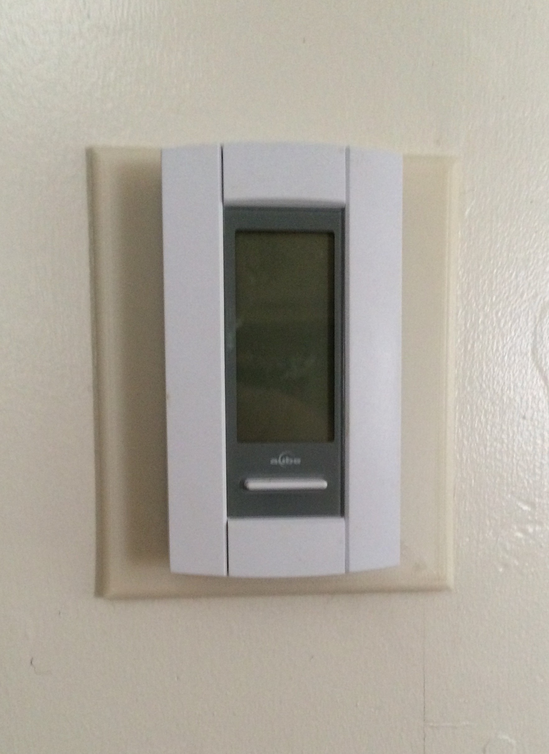 Simple thermostat wall trim plates