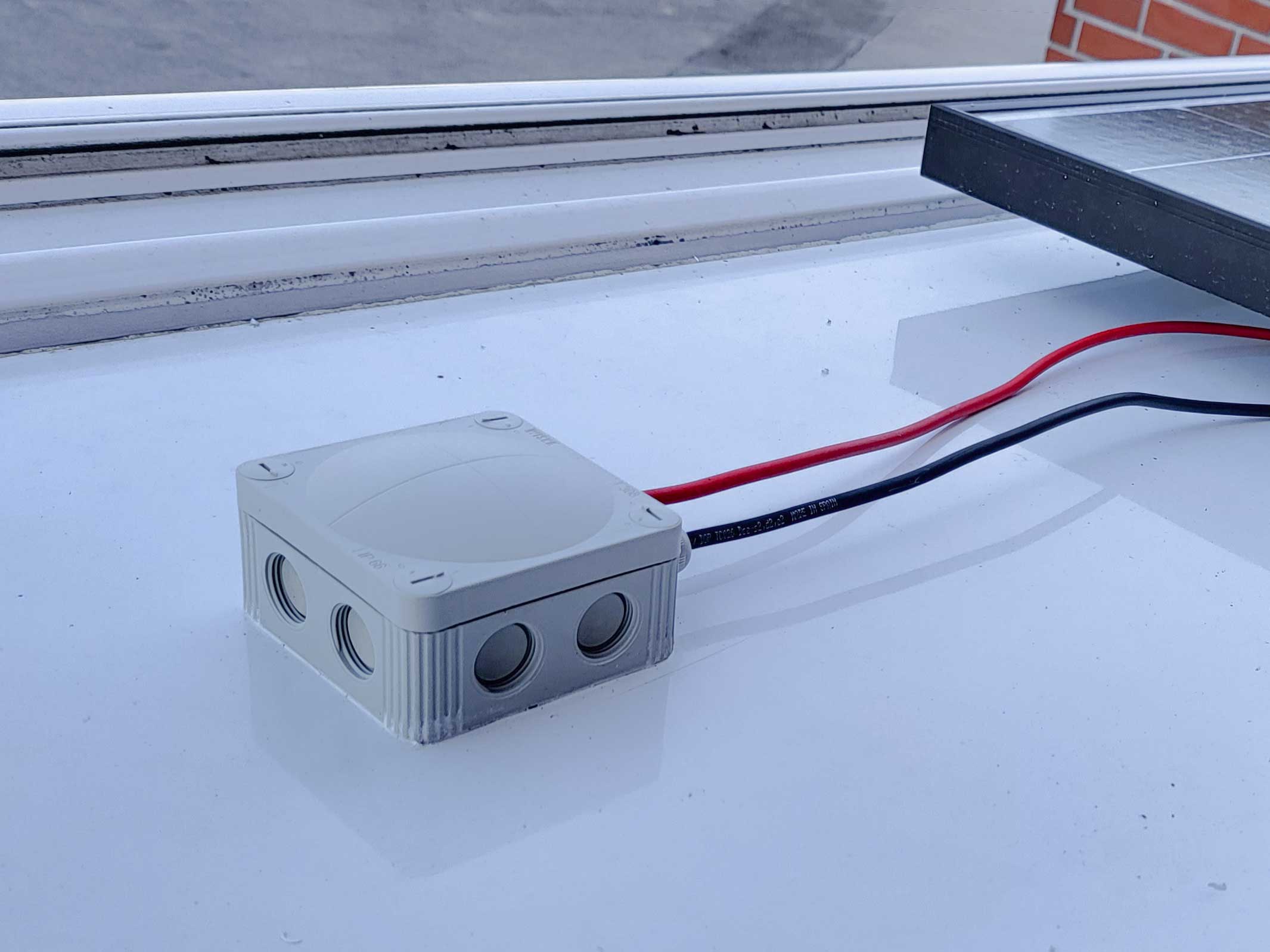 Cable passthrough liner tube for RV roof solar installation by