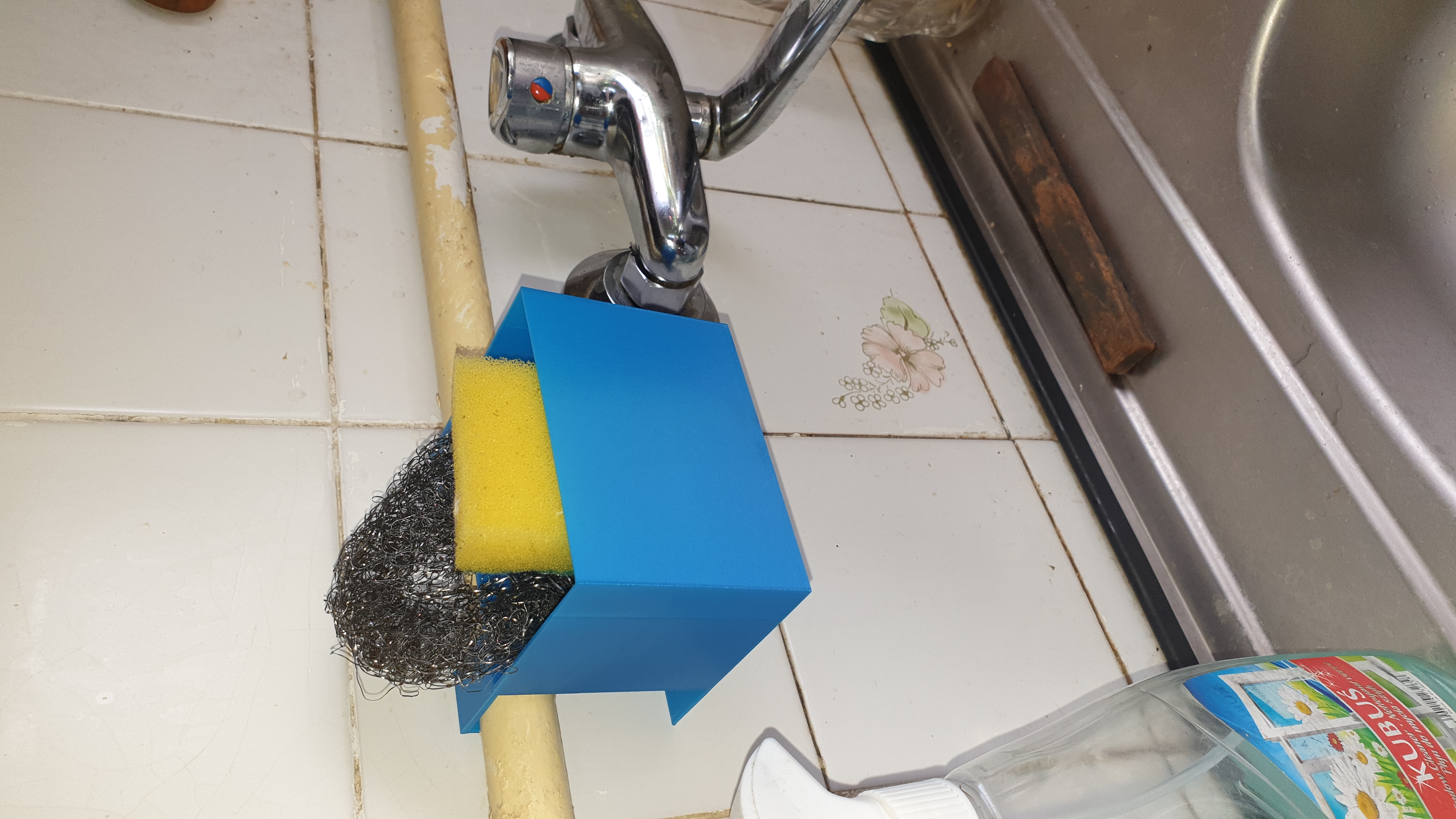 Pipe dish wash sponge holder with drainer