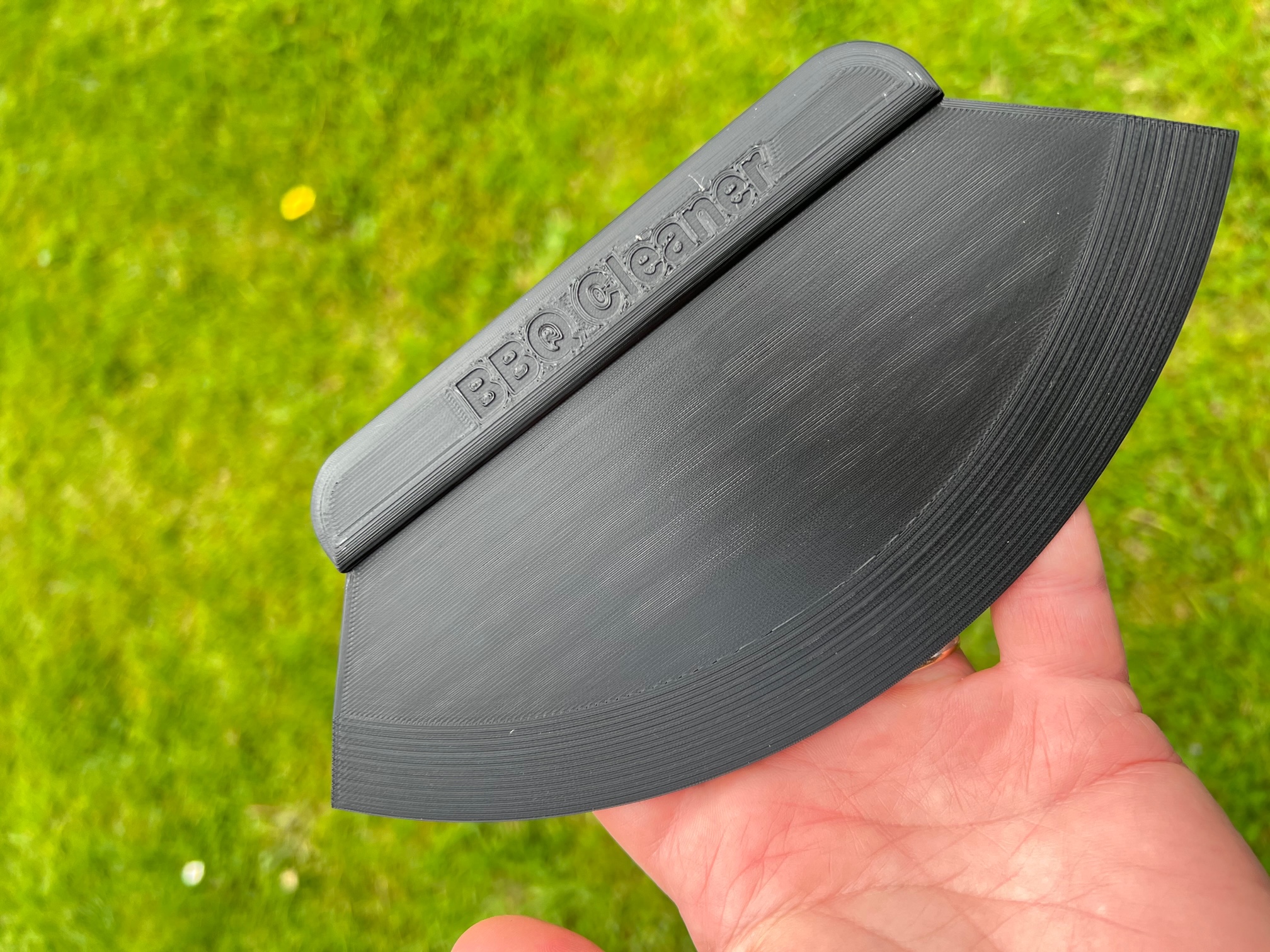 BBQ Cleaner, Barbecue scraper, with rounded shape.
