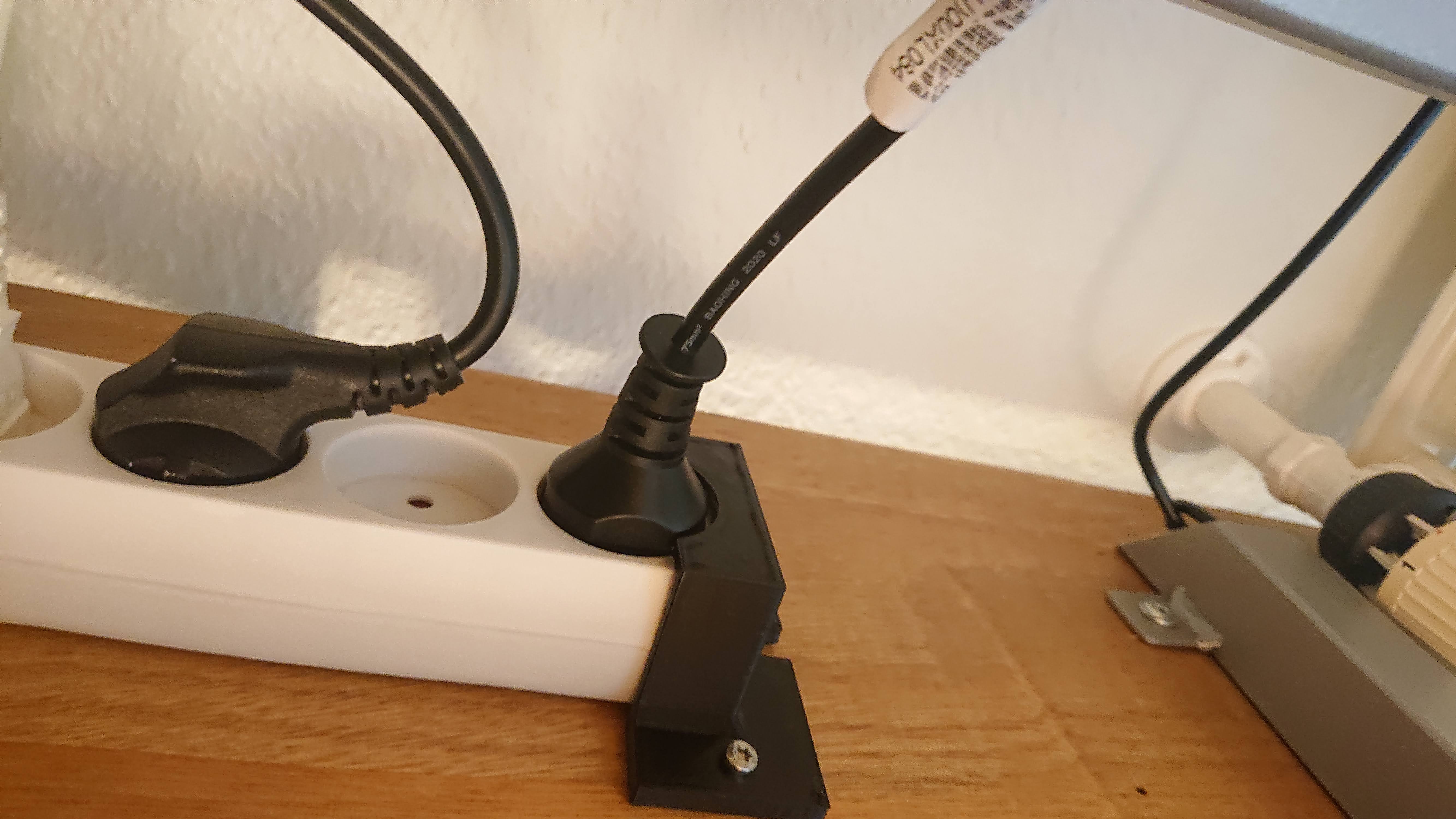 Bracket for a power strip