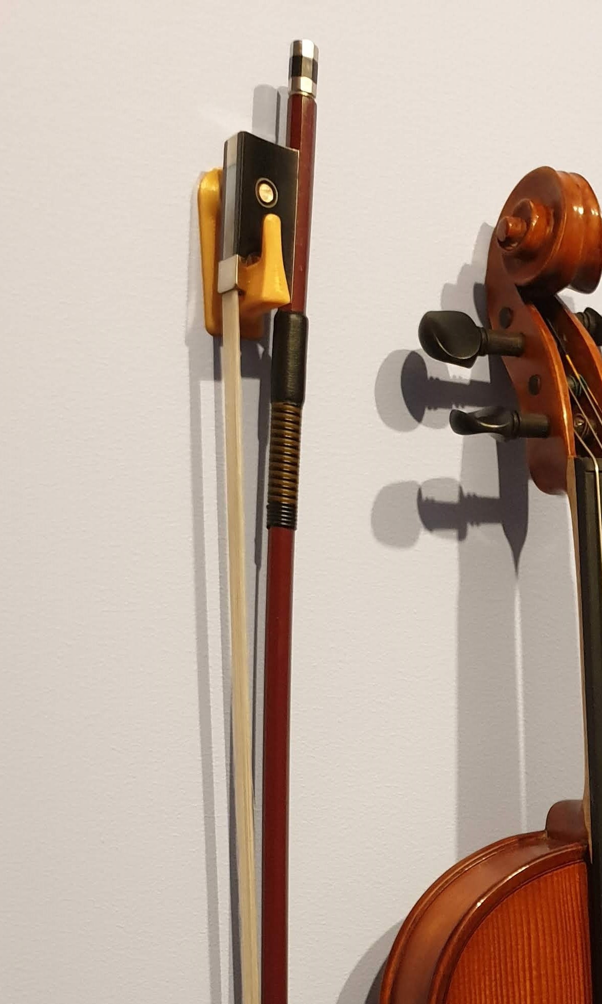 Violin bow wall hanger