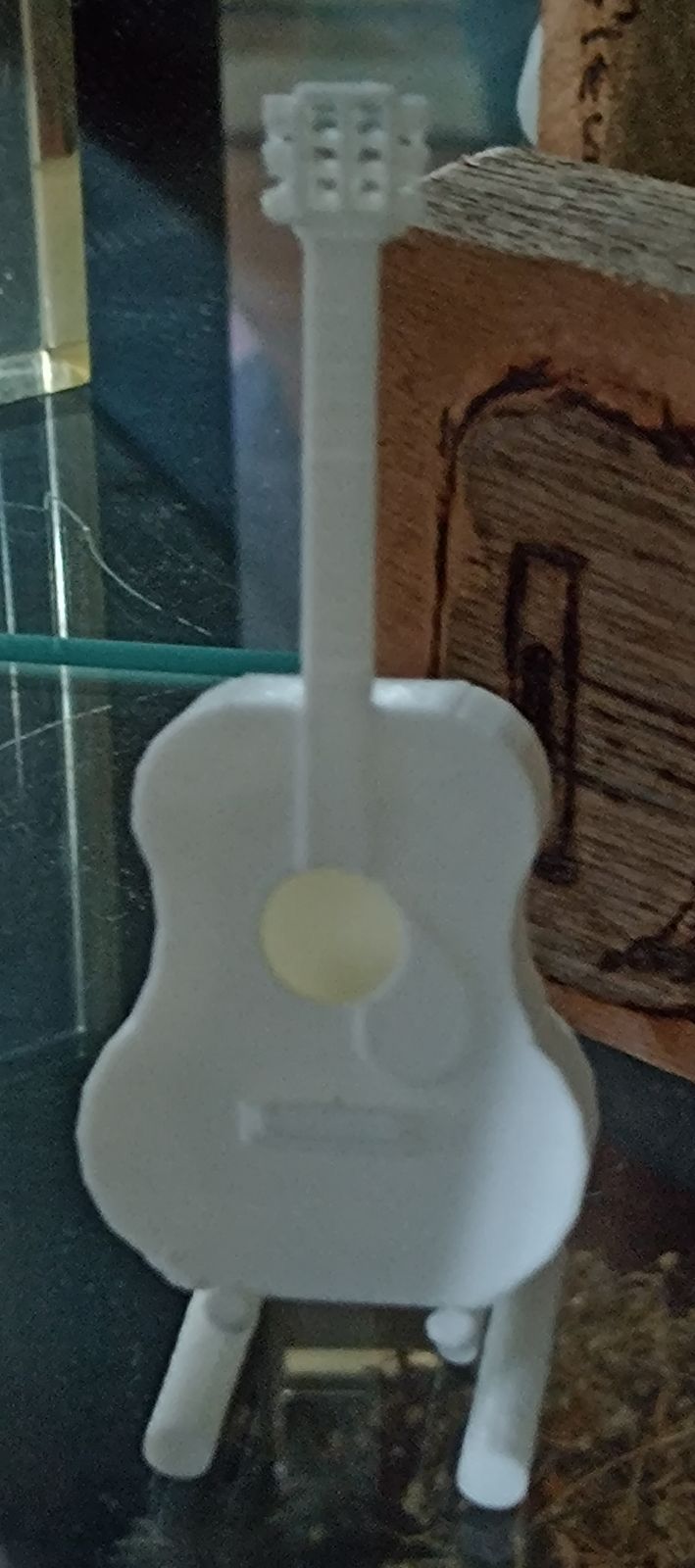 mini acoustig guitar and stand