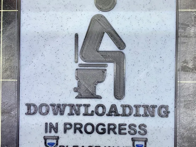 Downloading in Progress - Toilet Sign