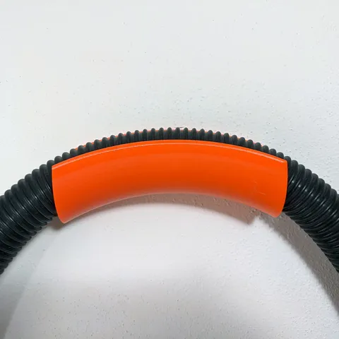 Vacuum hose holder (držák hadice)