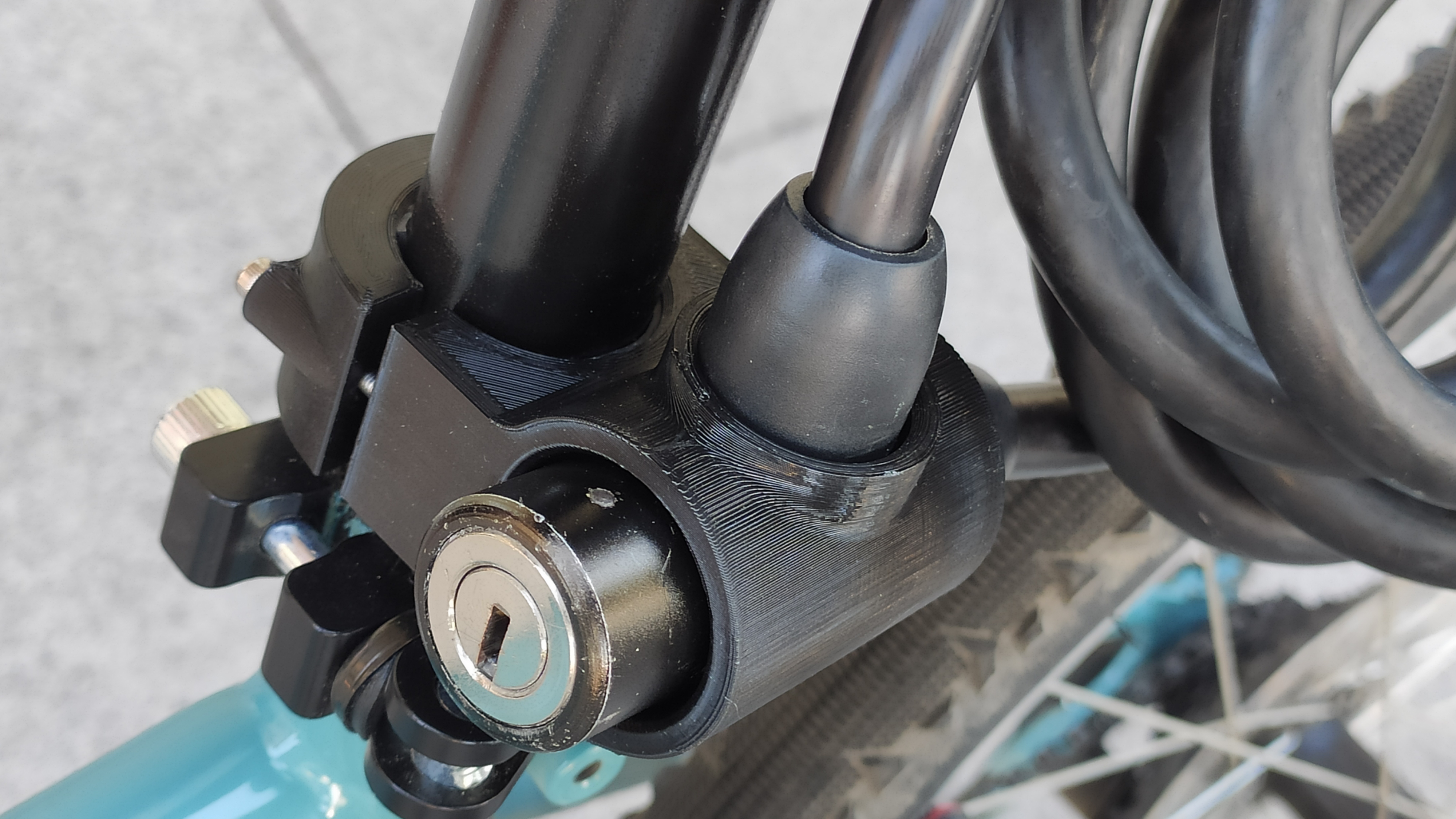 Bike cable lock holder
