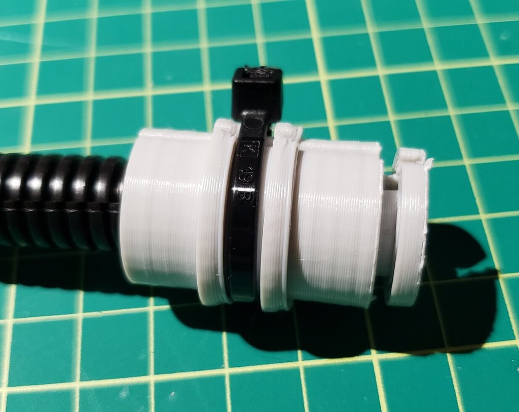 Miniatura 6 do modelo 3D Split flex wire loom thru panel fitting