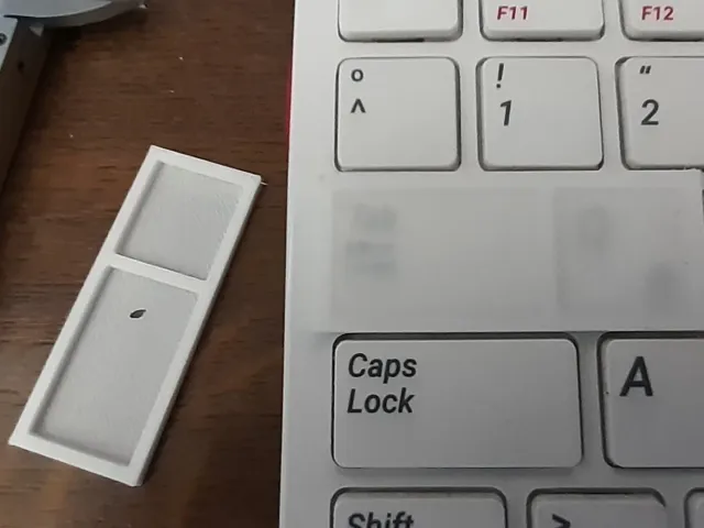 Prototype of coffee proof "see through" single layer on top of Raspberry Pi400 keyboard for typing