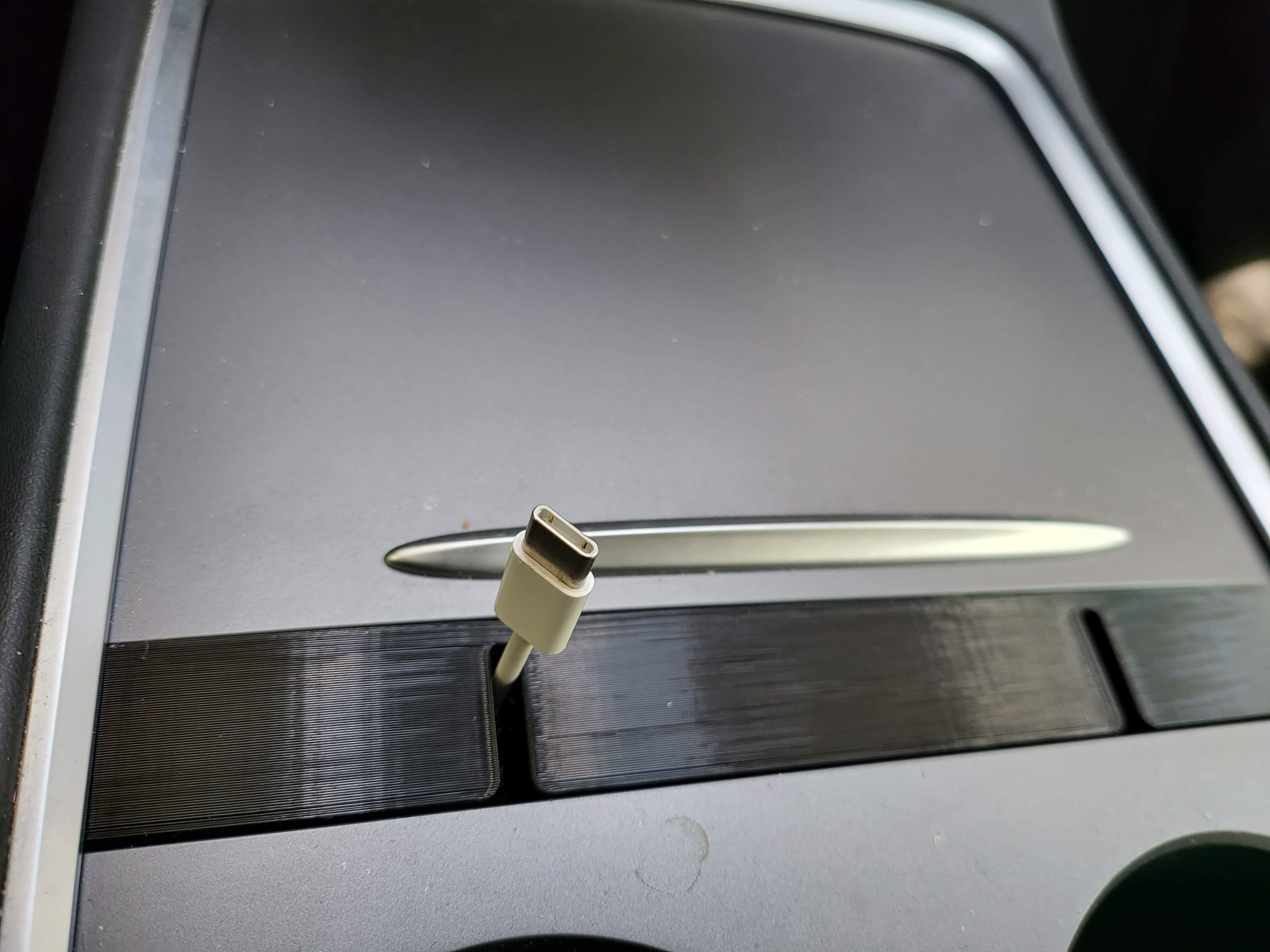 Tesla model Y center console cable holder