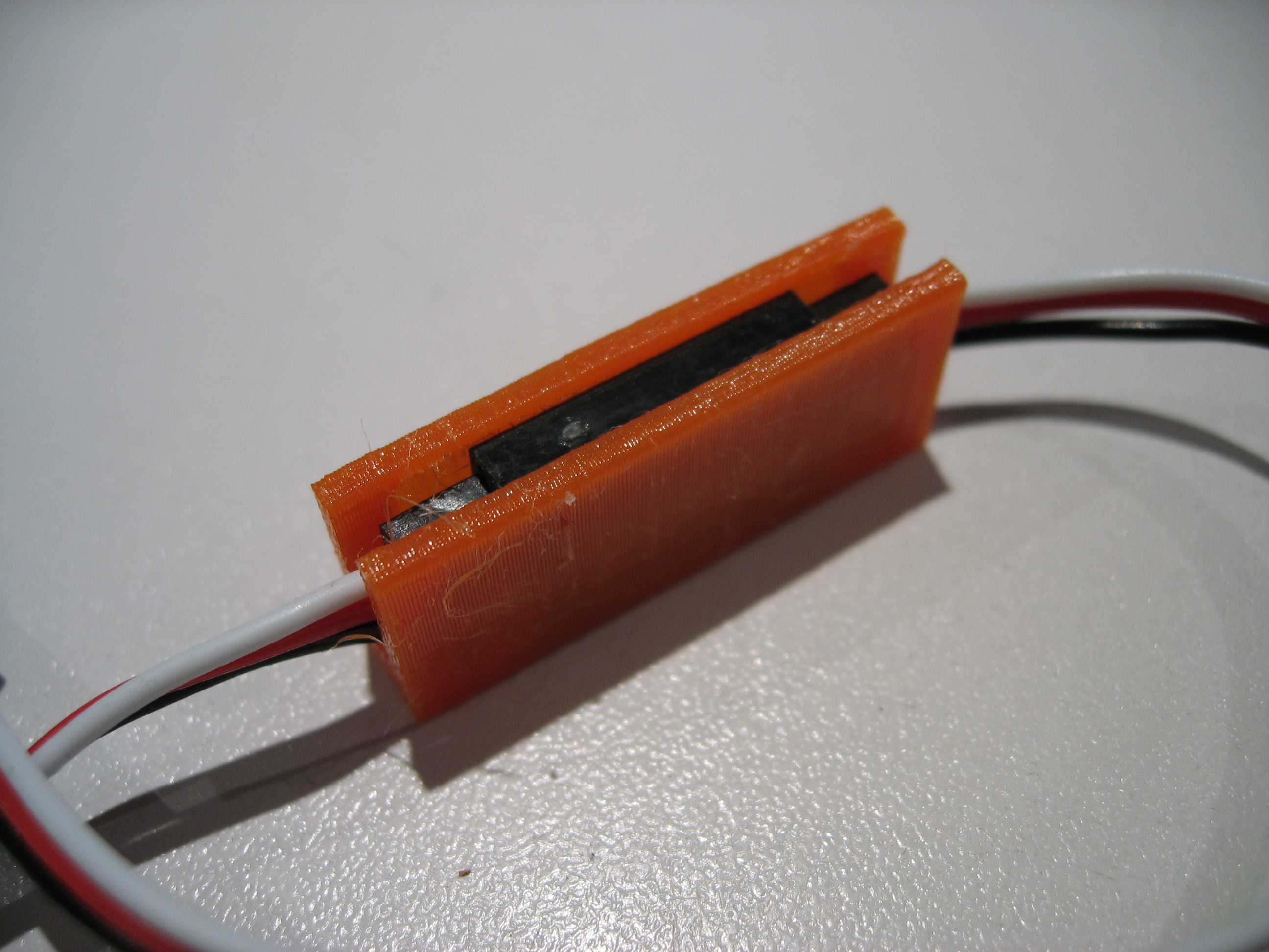 RC servo connector retaining clip by LowZ Download free STL model